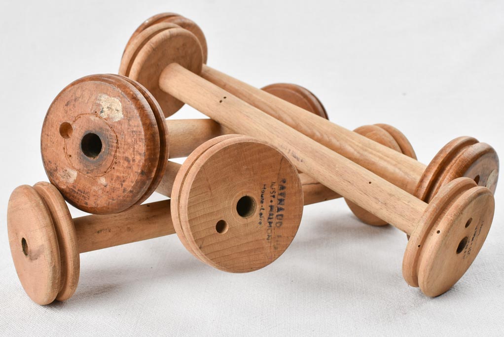 Aged wooden bobbins with character