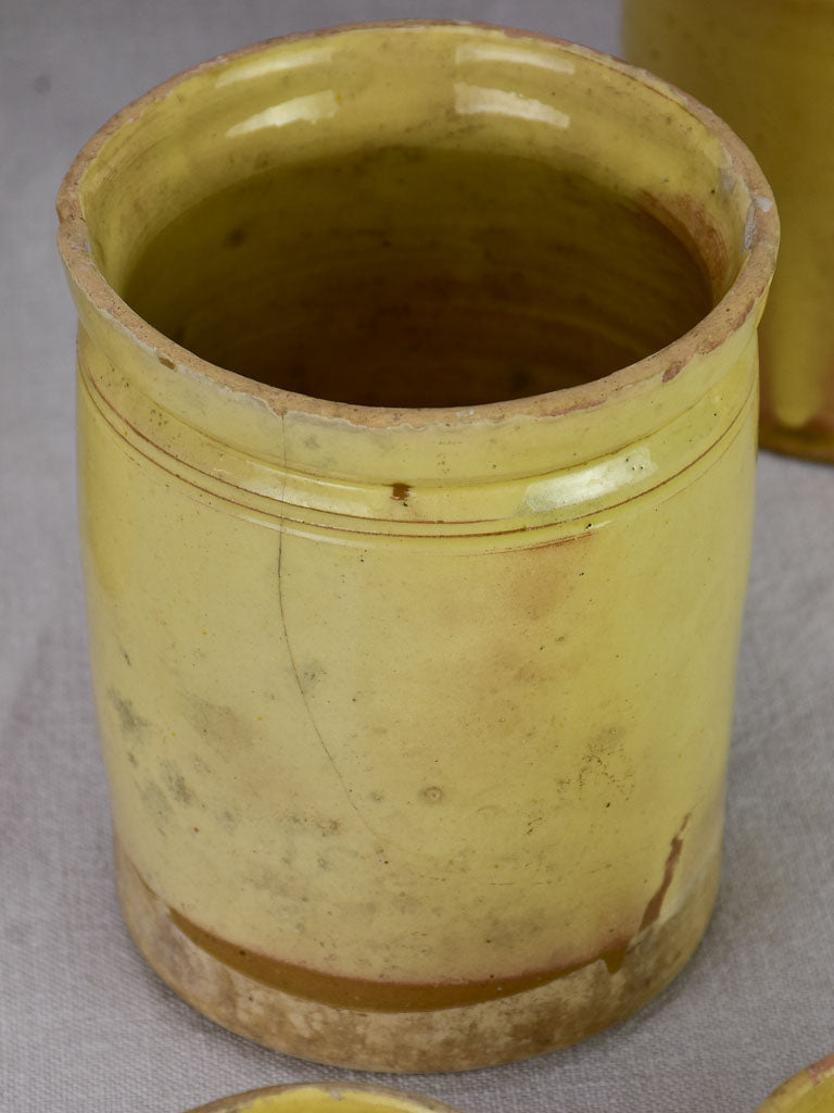 Collection of 7 antique French yellow ware preserving pots