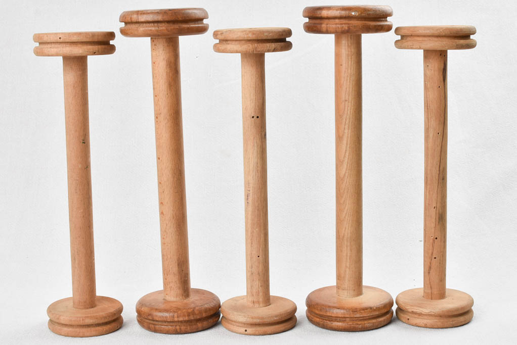 Mid-century oak bobbins with branding