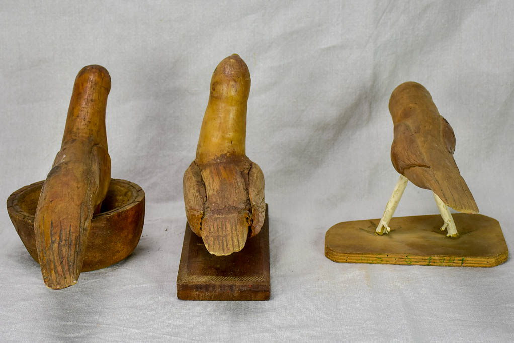 Three antique French primitive wooden sculptures of birds