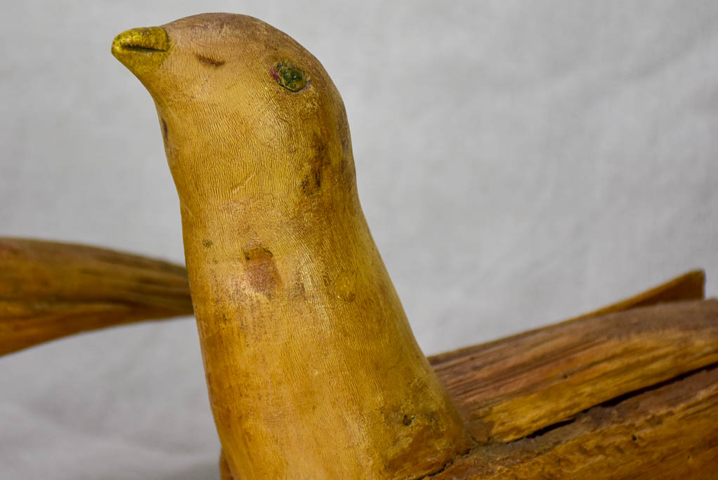 Three antique French primitive wooden sculptures of birds