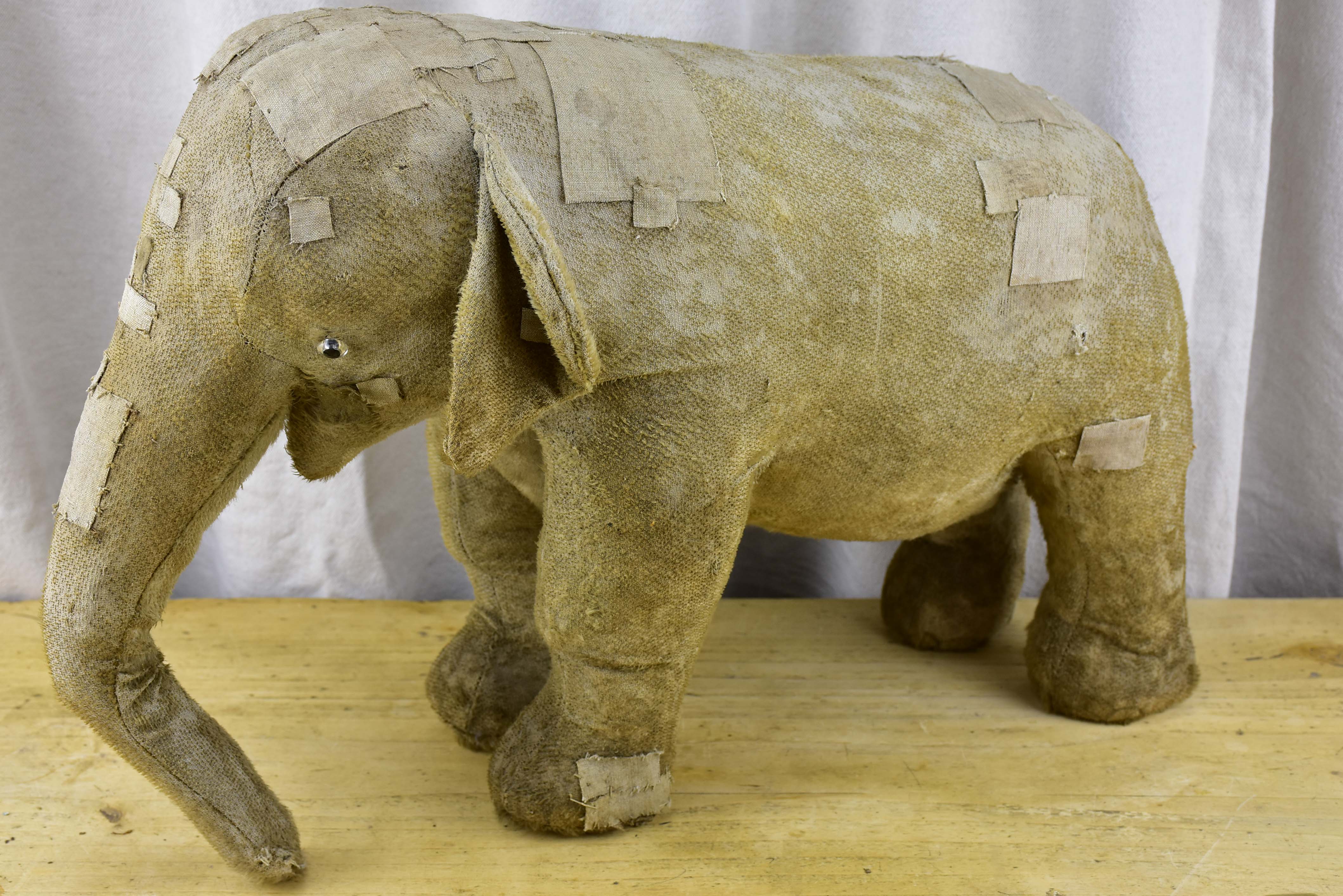 Three antique French toy elephants