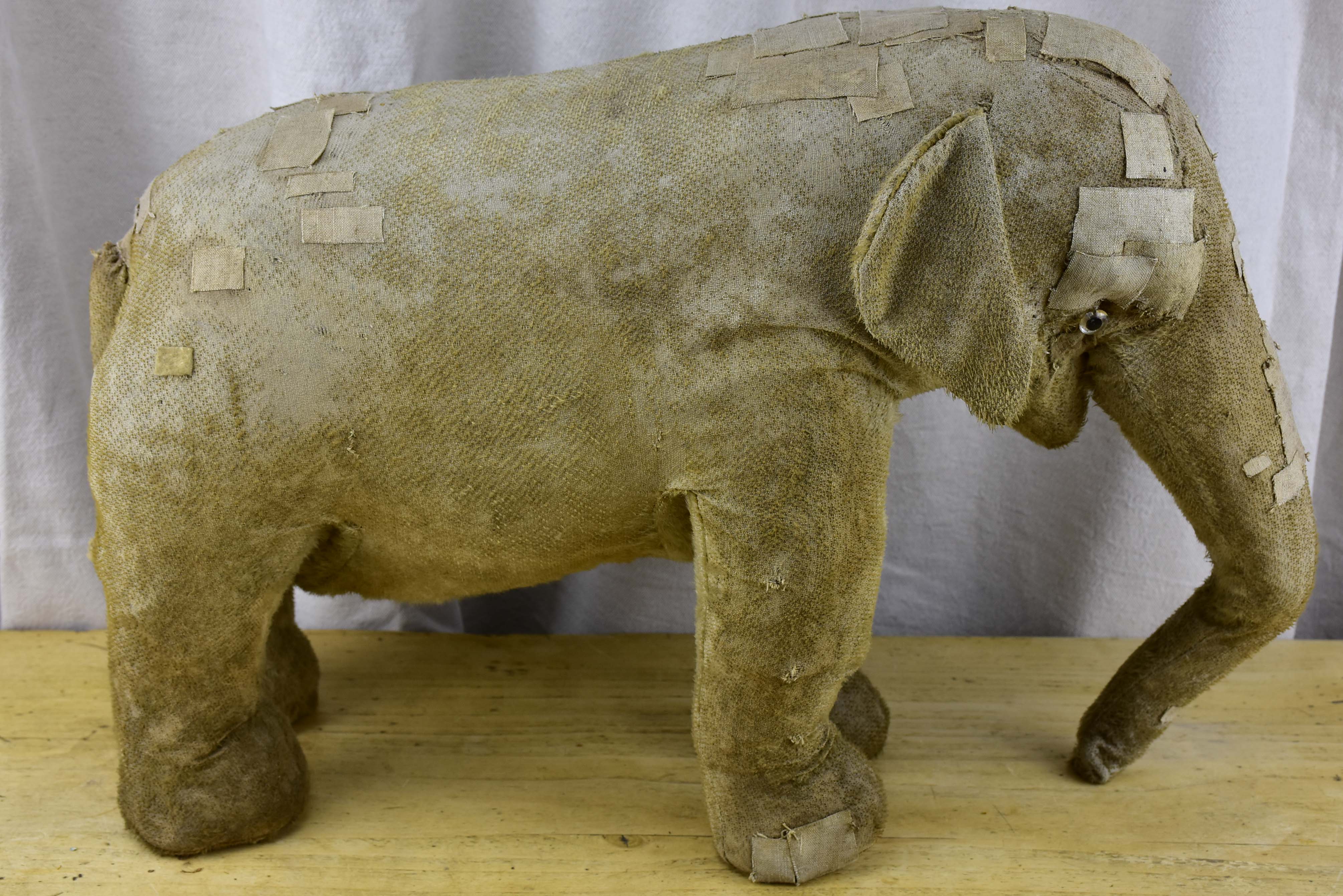 Three antique French toy elephants