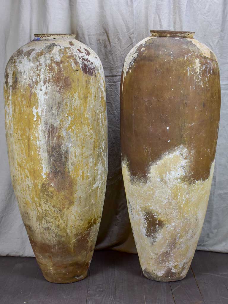 Pair of very tall antique Greek water pots 49"