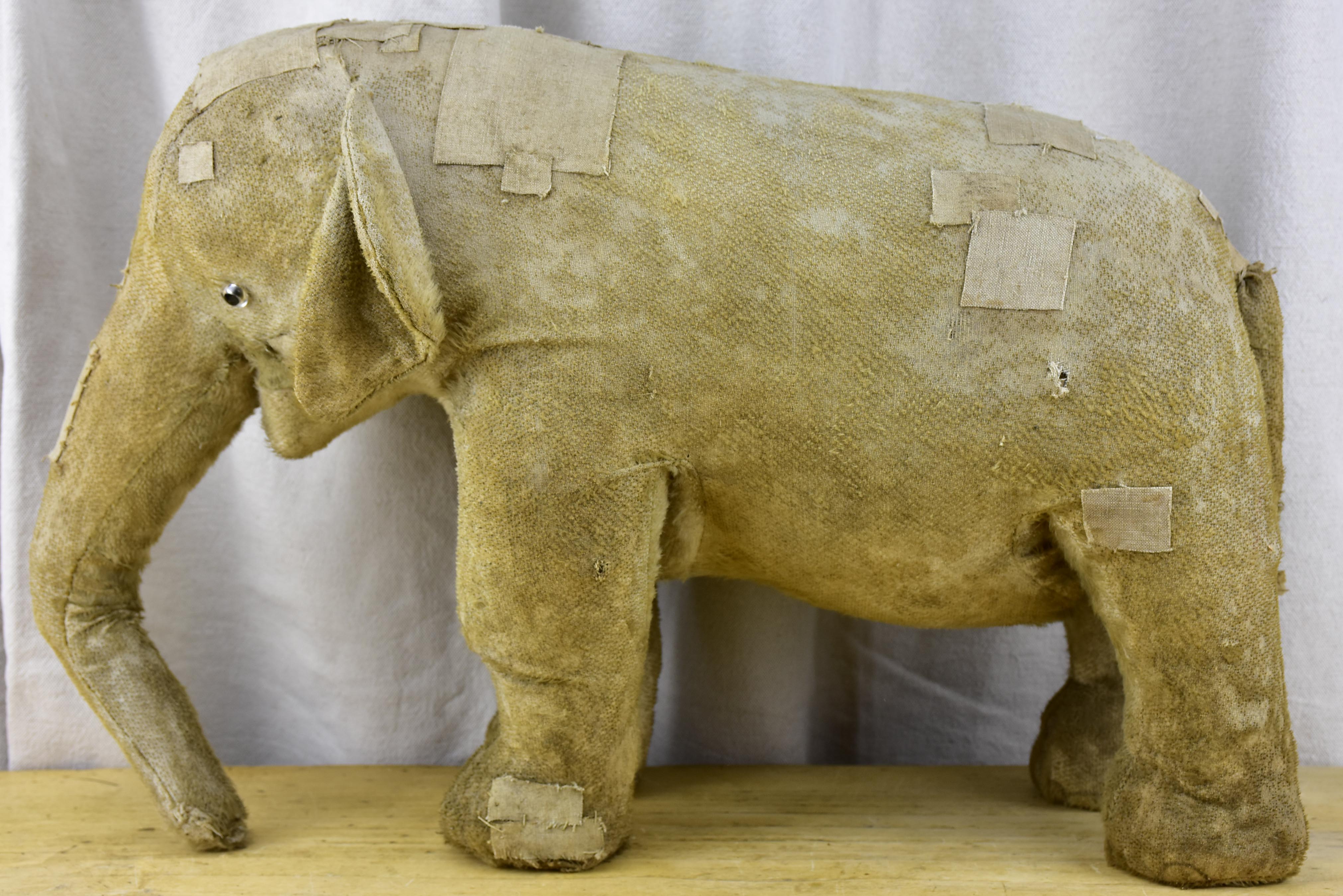 Three antique French toy elephants