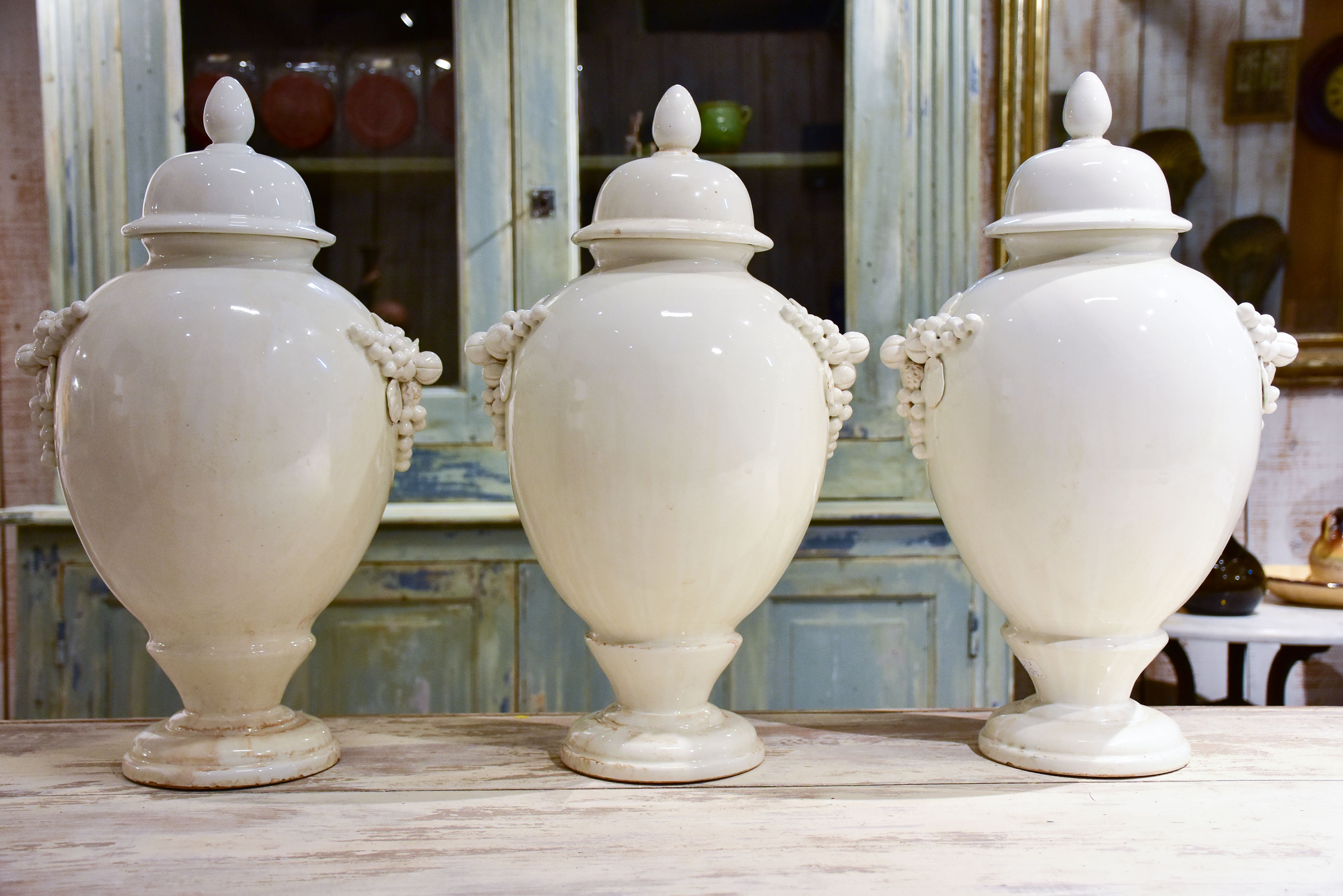 Collection of three antique ironstone pharmacy jars