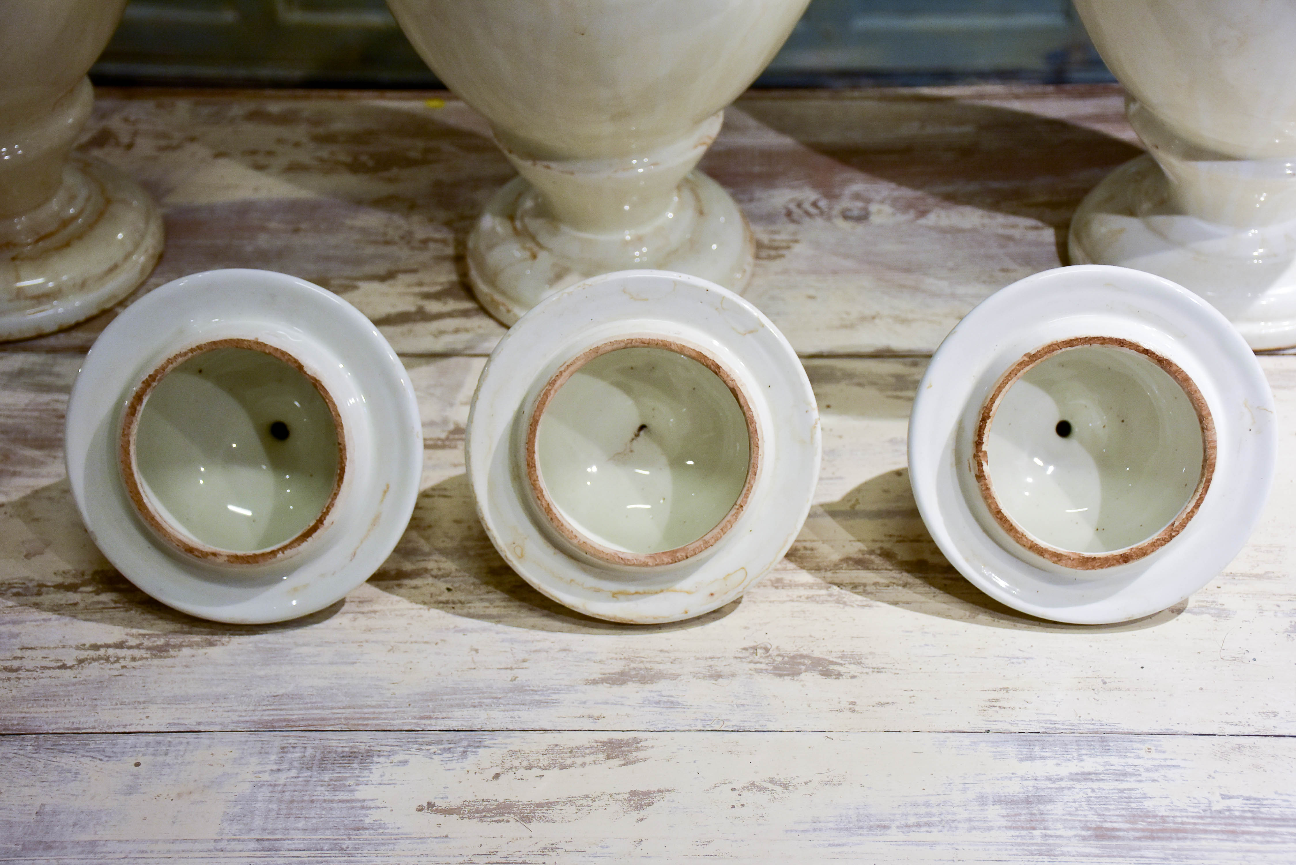 Collection of three antique ironstone pharmacy jars