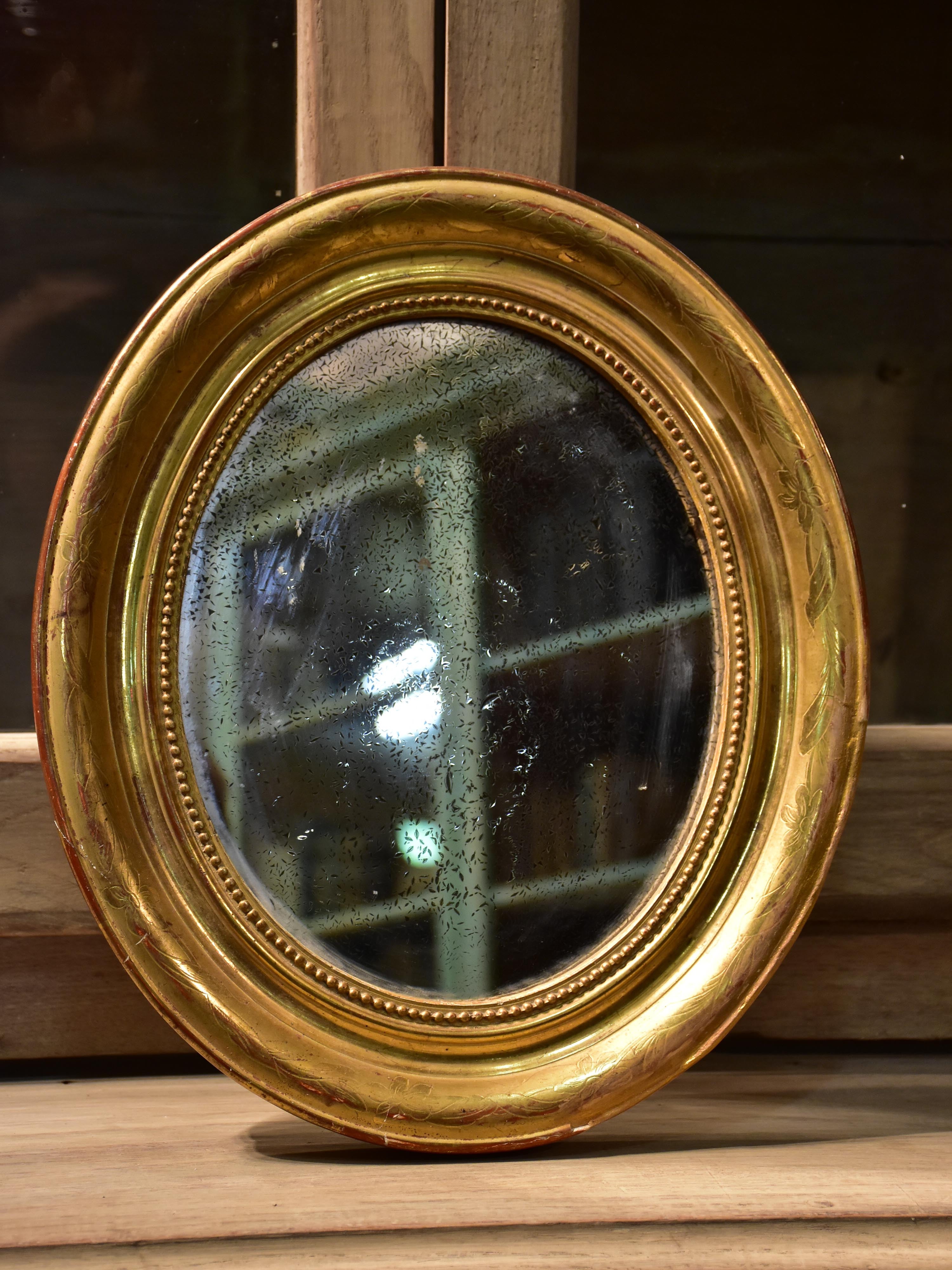 Mid-19th century oval Louis Philippe mirror