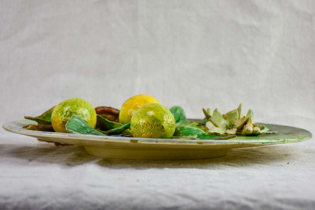 Two Barbotine plates decorated with lemons and oranges - Longchamp 19th Century 12½"