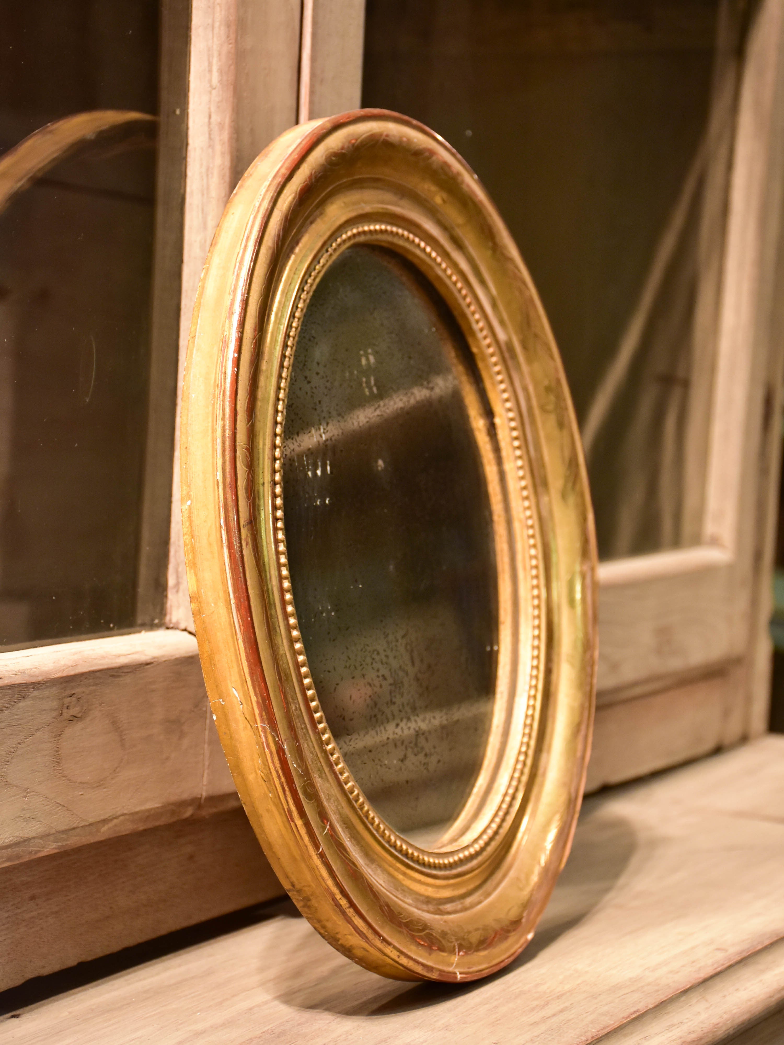 Mid-19th century oval Louis Philippe mirror