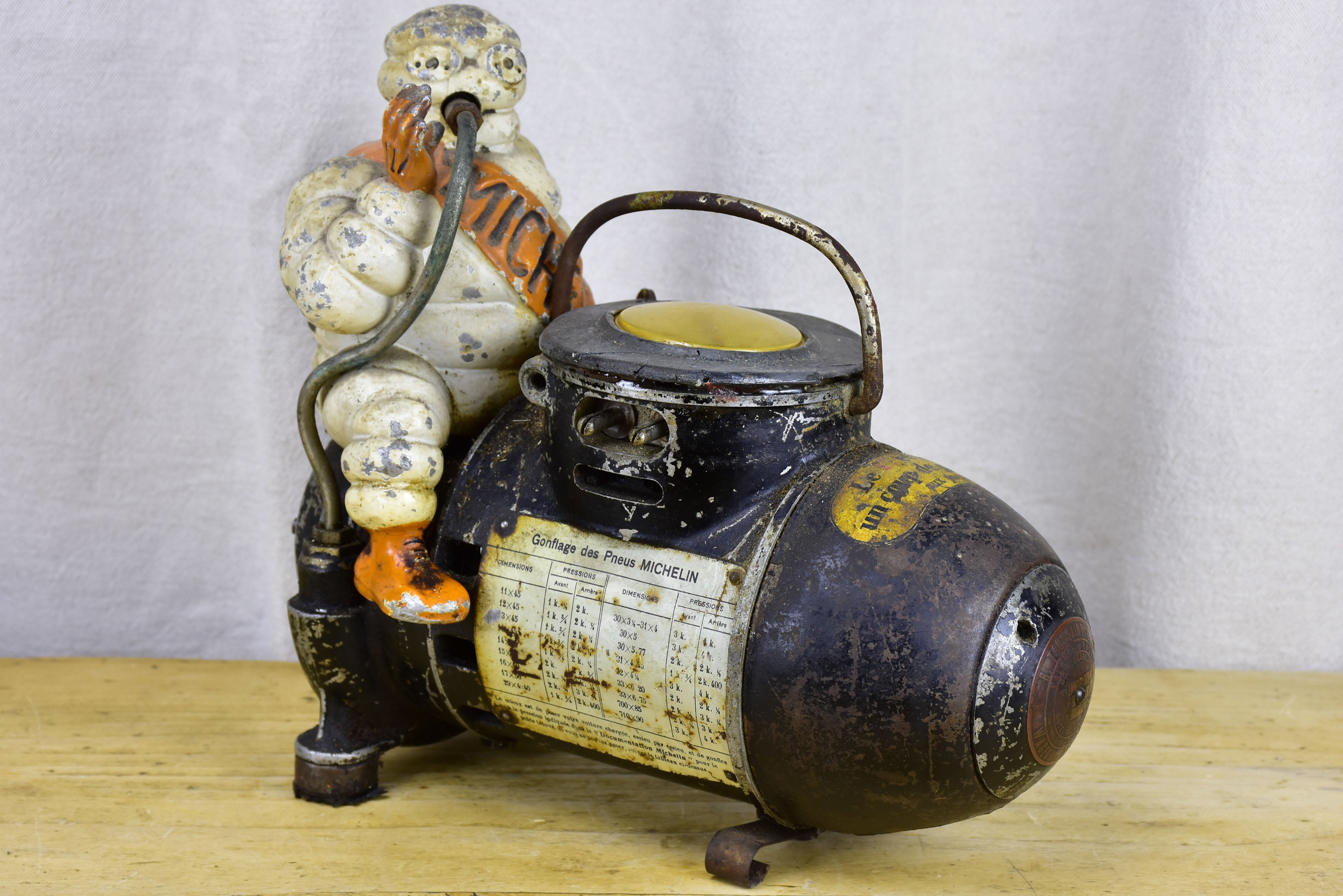 Antique French Michelin Man air compressor