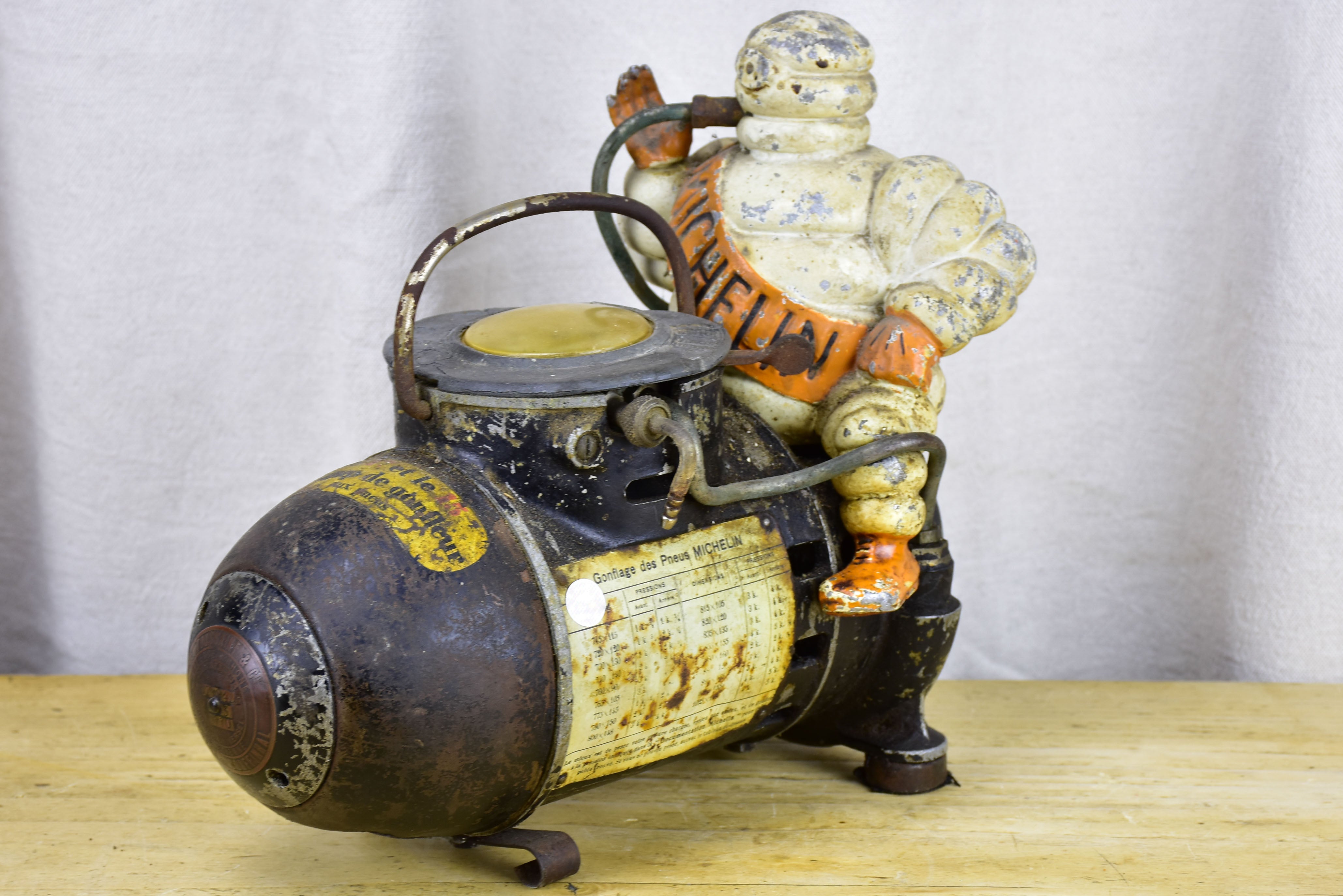 Antique French Michelin Man air compressor