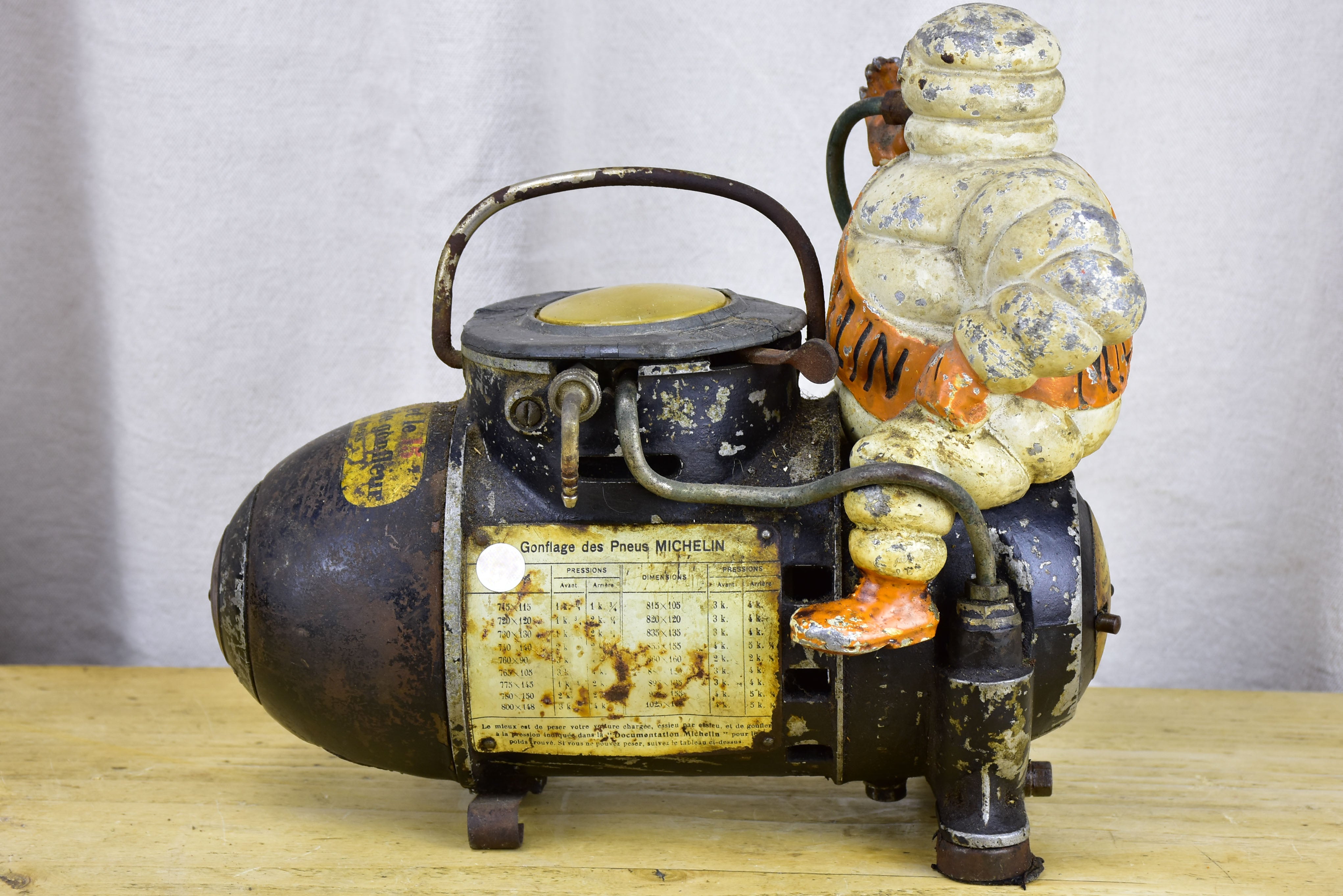 Antique French Michelin Man air compressor