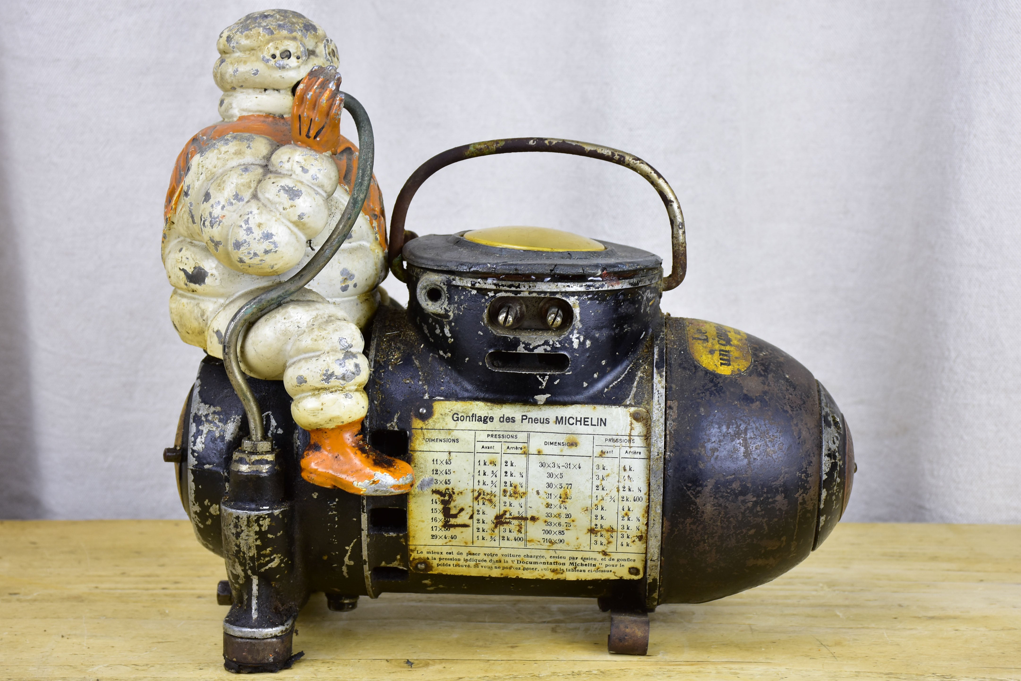 Antique French Michelin Man air compressor