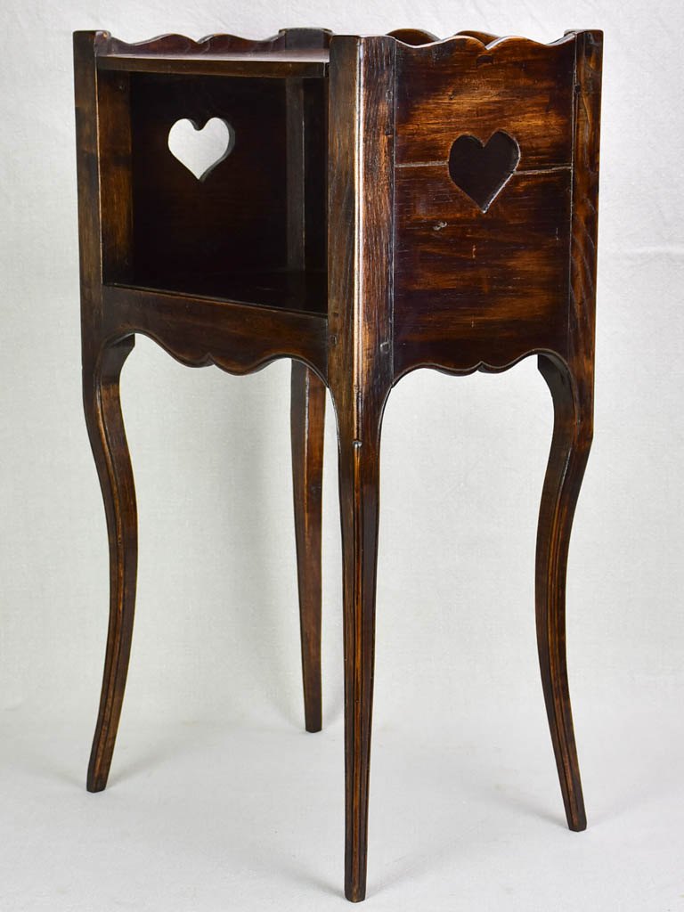 Louis XV nightstand with heart-shaped cut outs