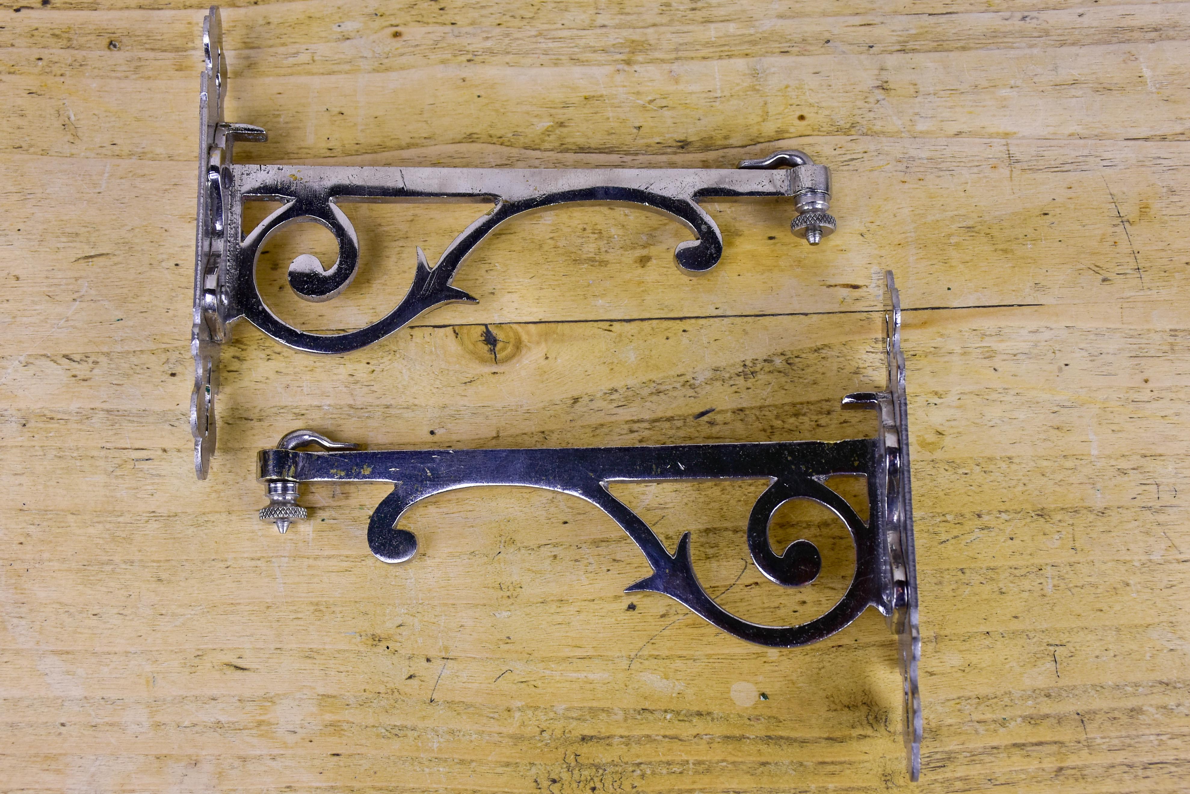 Two pairs of antique French wall brackets for glass shelves