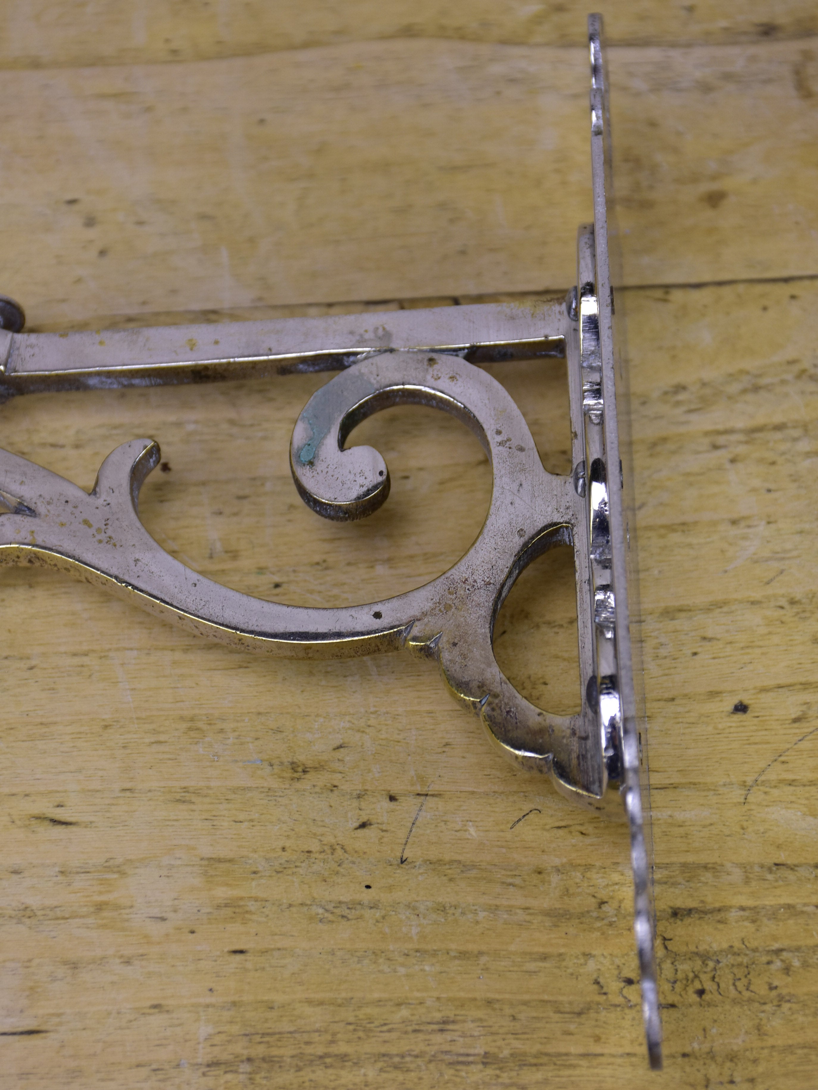 Two pairs of antique French wall brackets for glass shelves