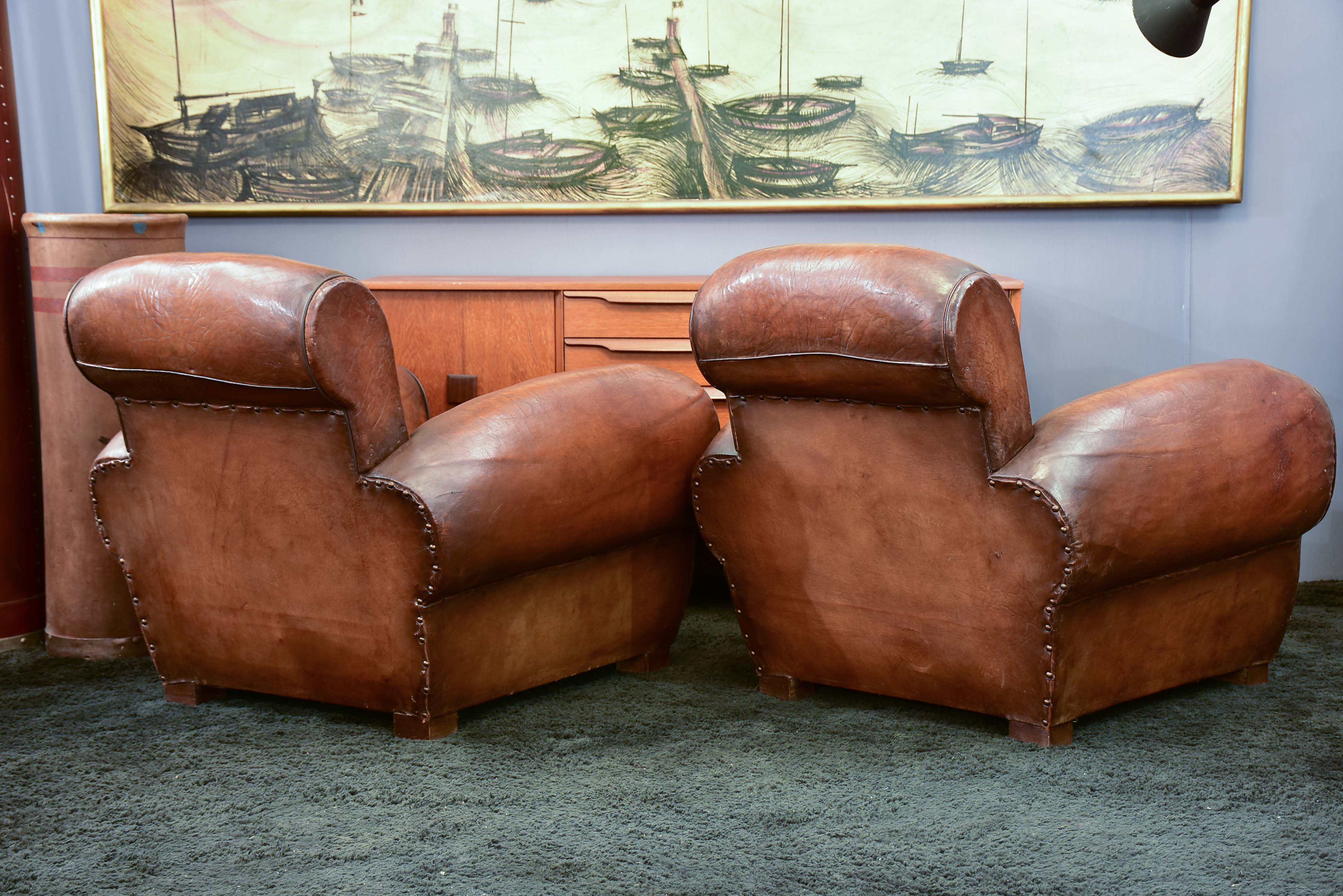 Three French leather club chairs