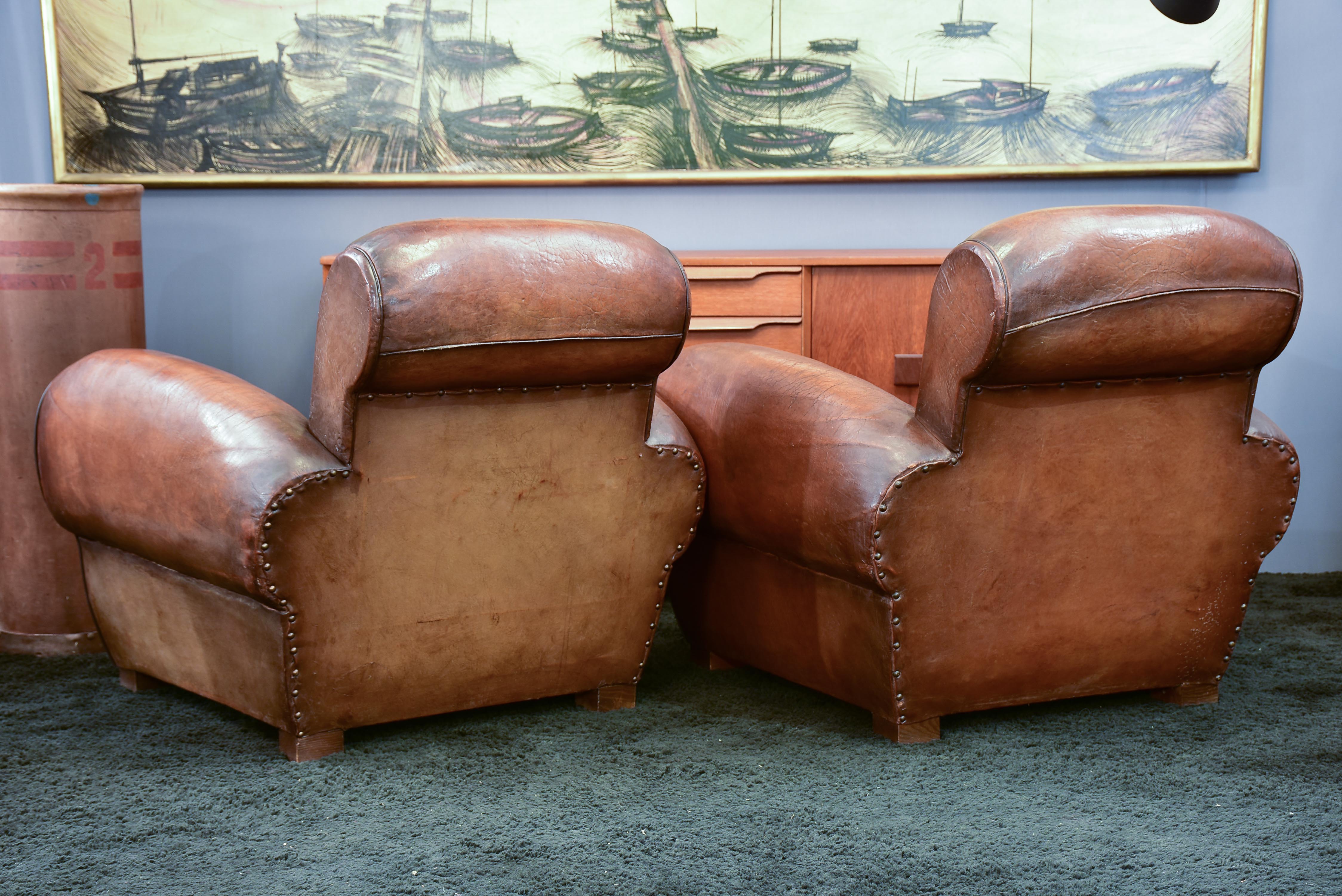 Three French leather club chairs