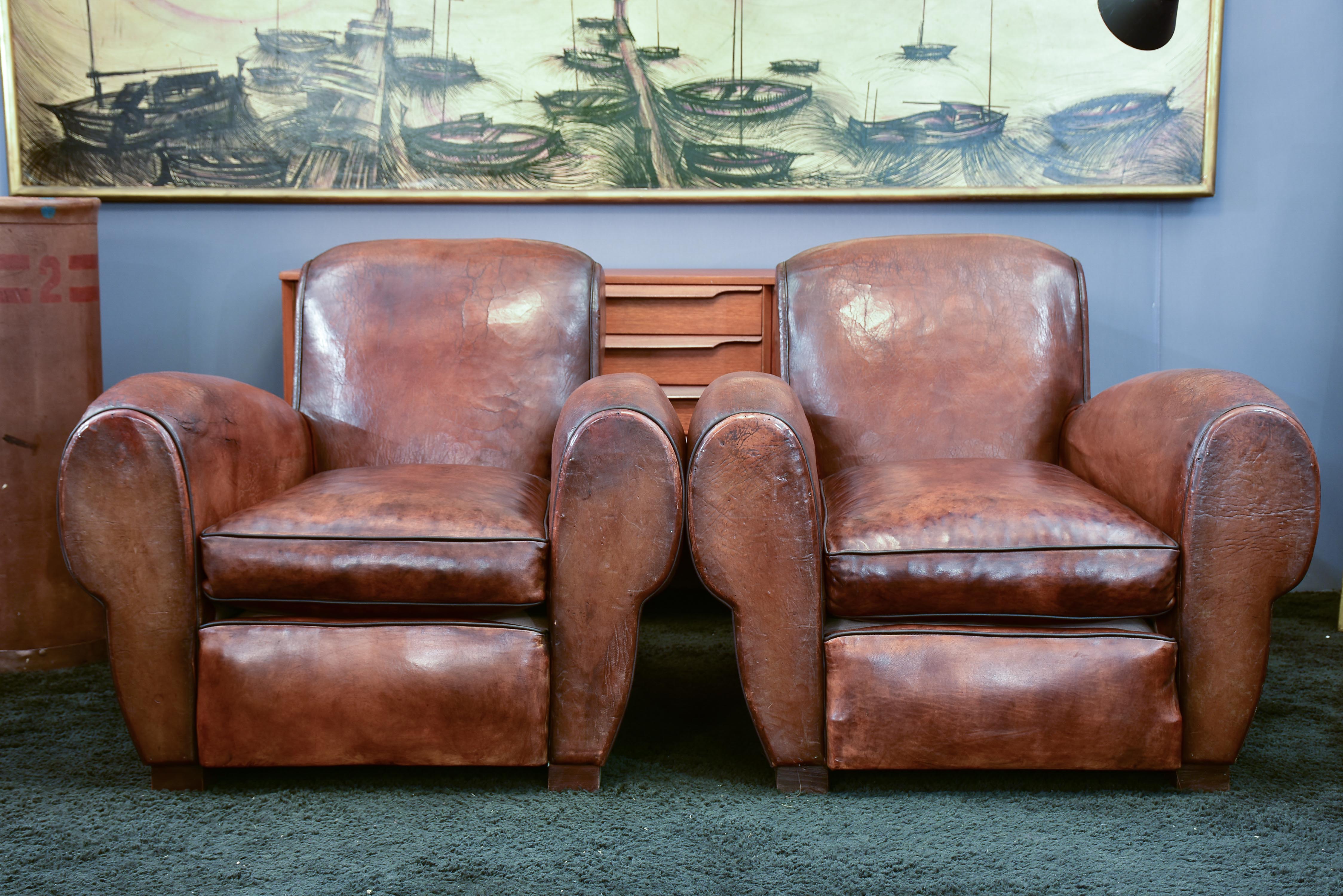 Three French leather club chairs