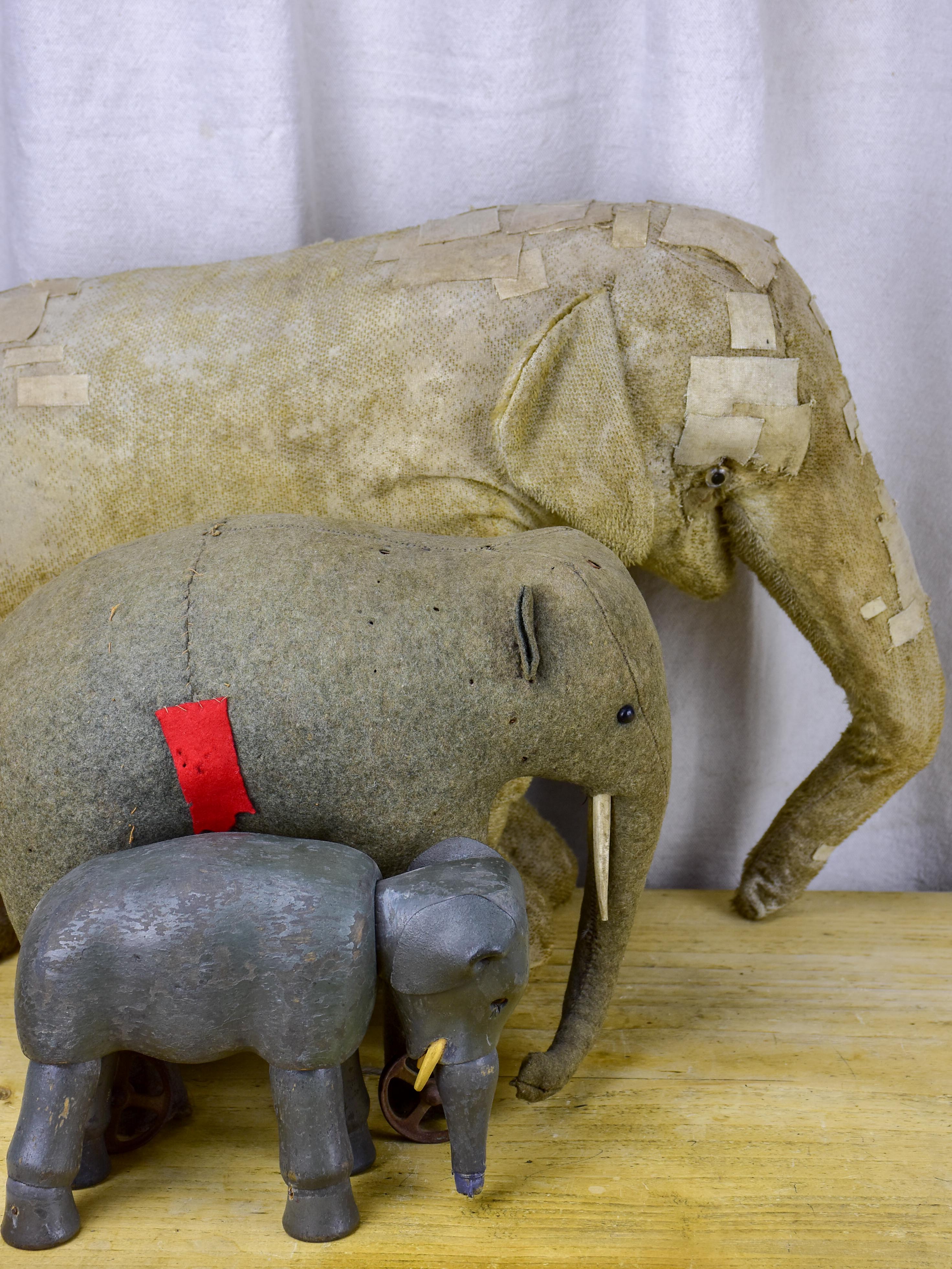 Three antique French toy elephants