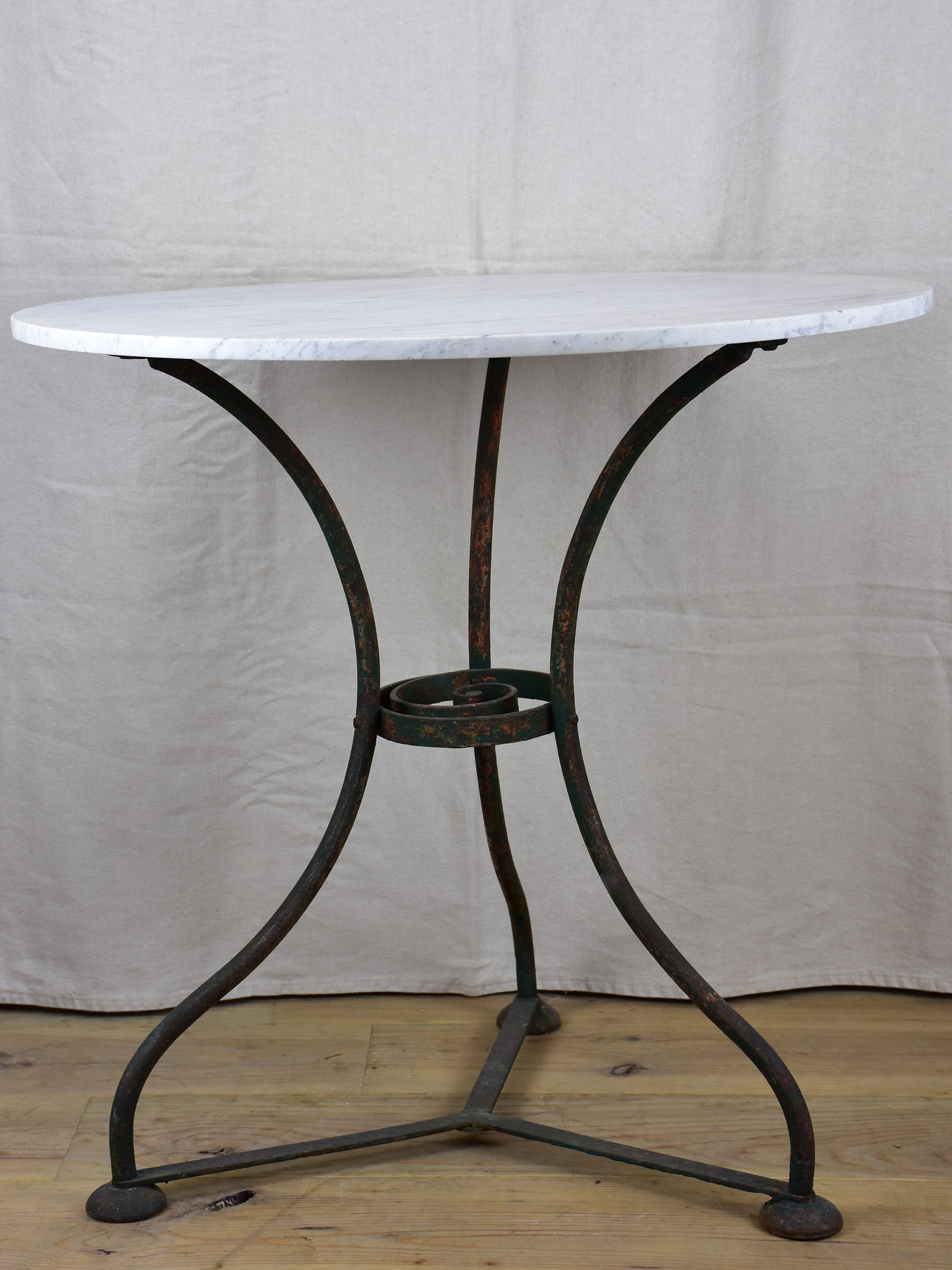 French garden table with marble top