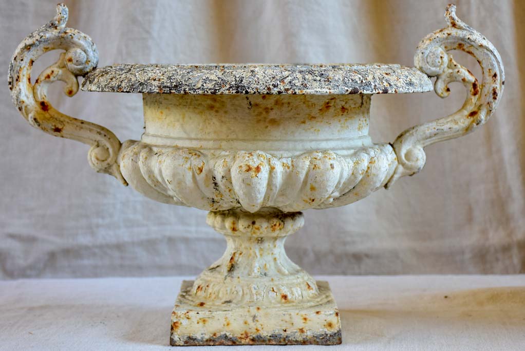 Pair of antique French Medici urns with handles