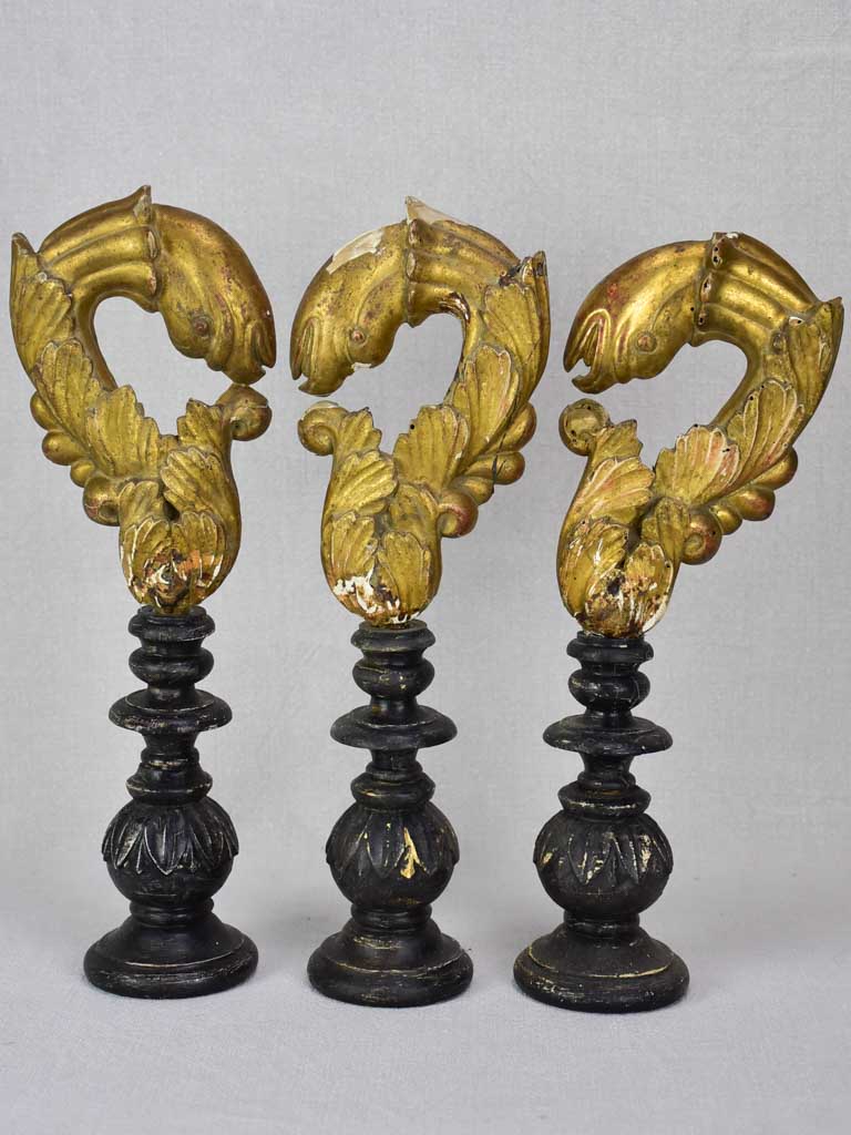 Collection of three salvaged gilt elements mounted on wooden supports 15¾"