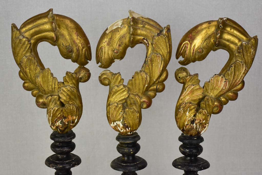 Collection of three salvaged gilt elements mounted on wooden supports 15¾"