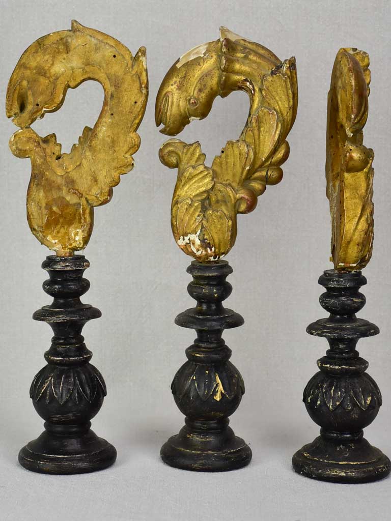 Collection of three salvaged gilt elements mounted on wooden supports 15¾"