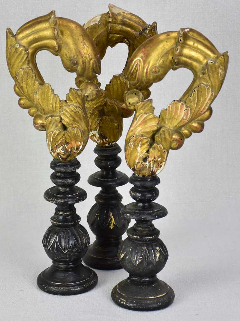 Collection of three salvaged gilt elements mounted on wooden supports 15¾"