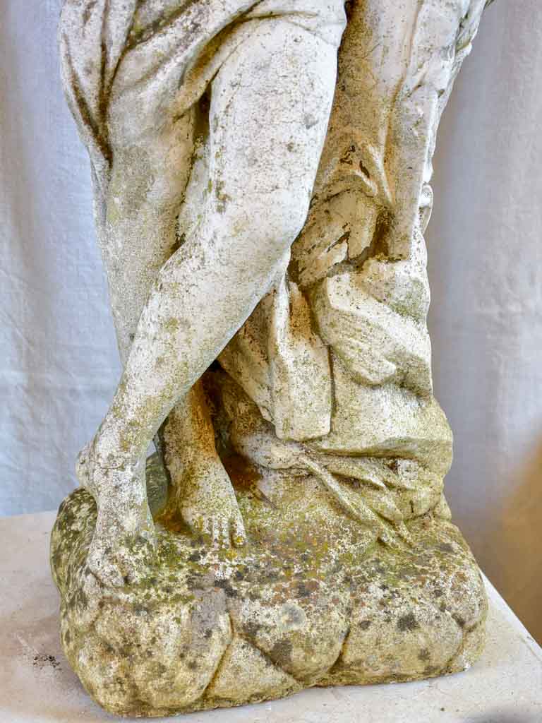 Garden fountain / sculpture of a draped woman with a water jug