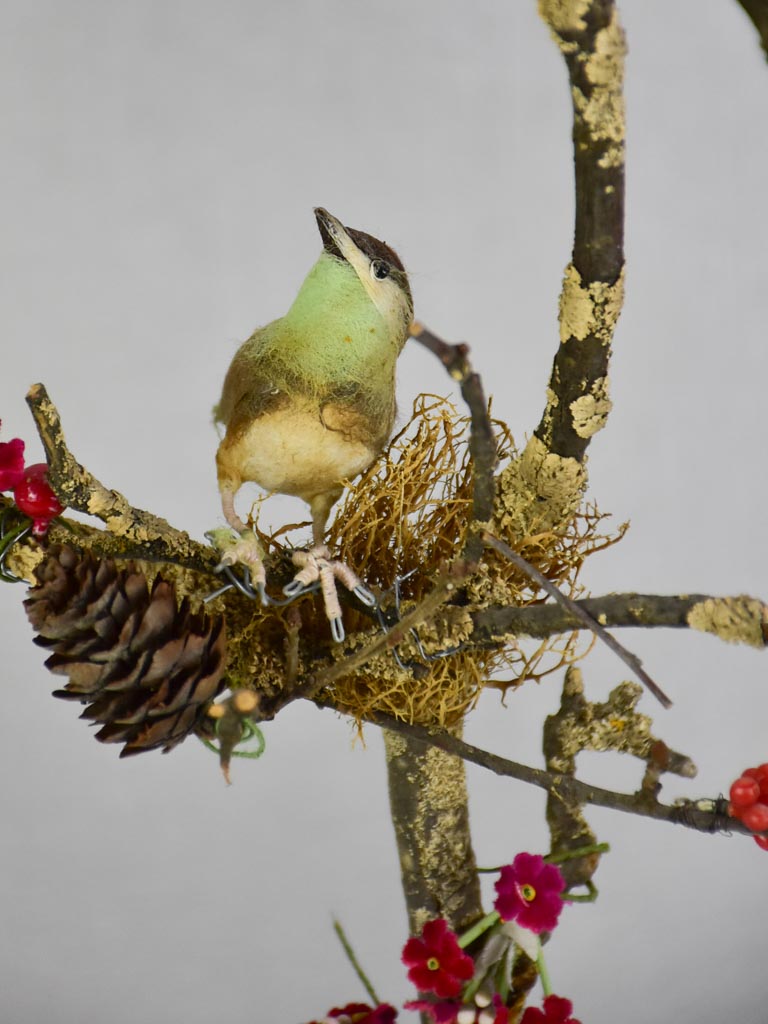 Collection of three artisan made birds on branches mounted on salvaged wooden supports 18"