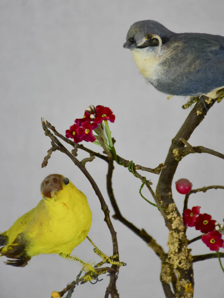 Collection of three artisan made birds on branches mounted on salvaged wooden supports 18"