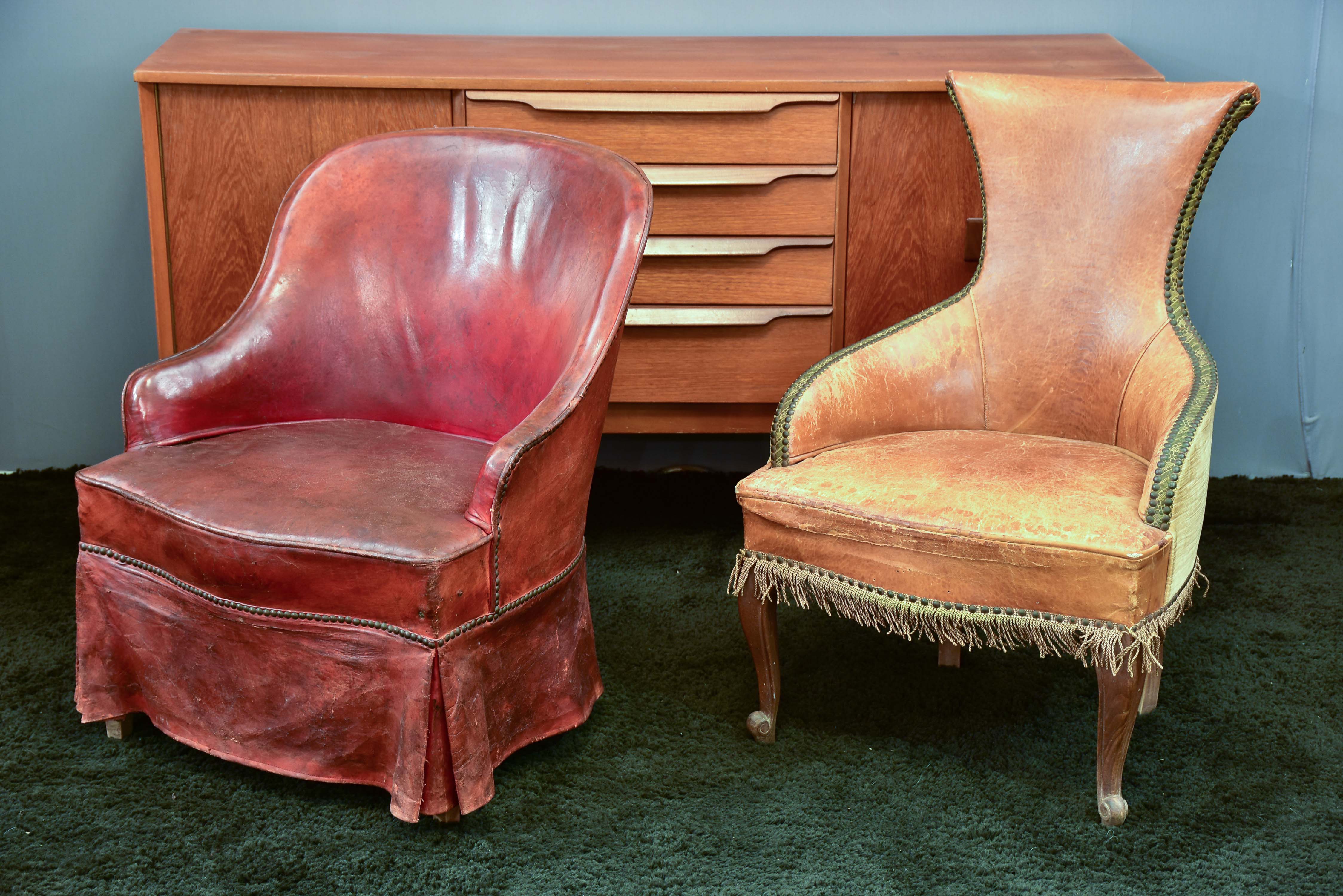 Two vintage slipper chairs - his and hers