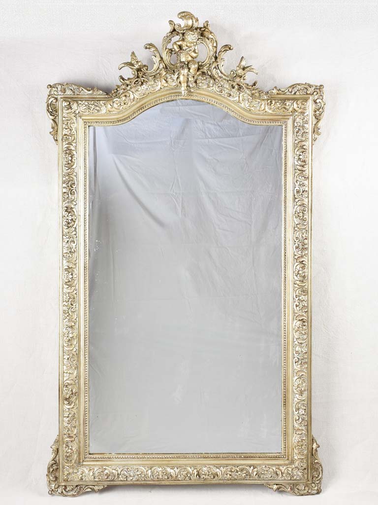 Large Napoleon III silver mirror w/ angel crest 63" x 37"