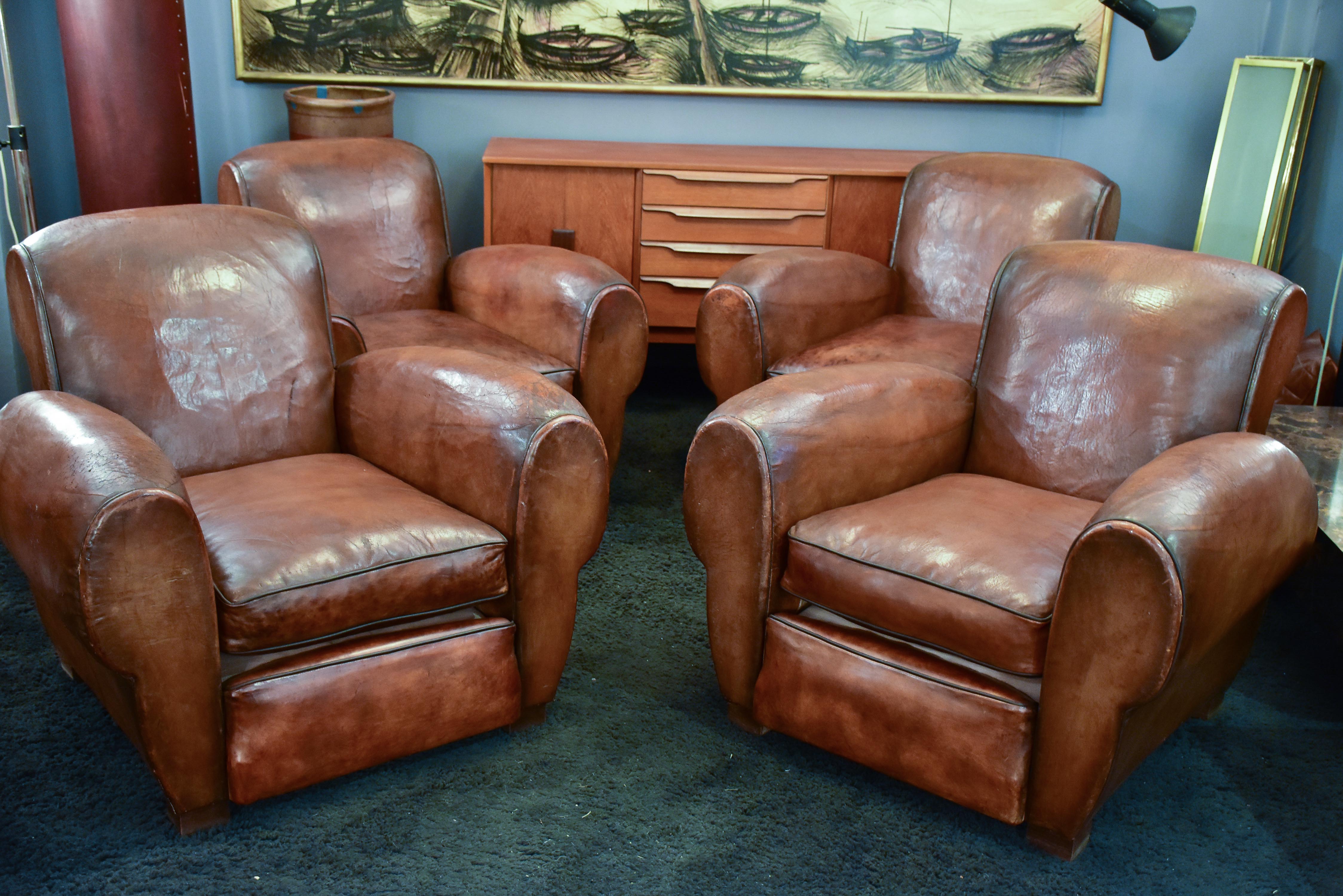 Three French leather club chairs