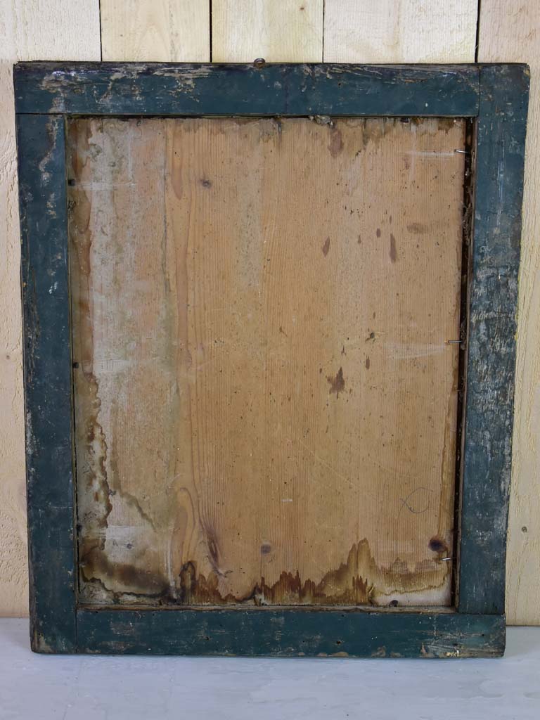 Antique French mirror with heavily aged glass and simple wooden frame 19¾" x 24"