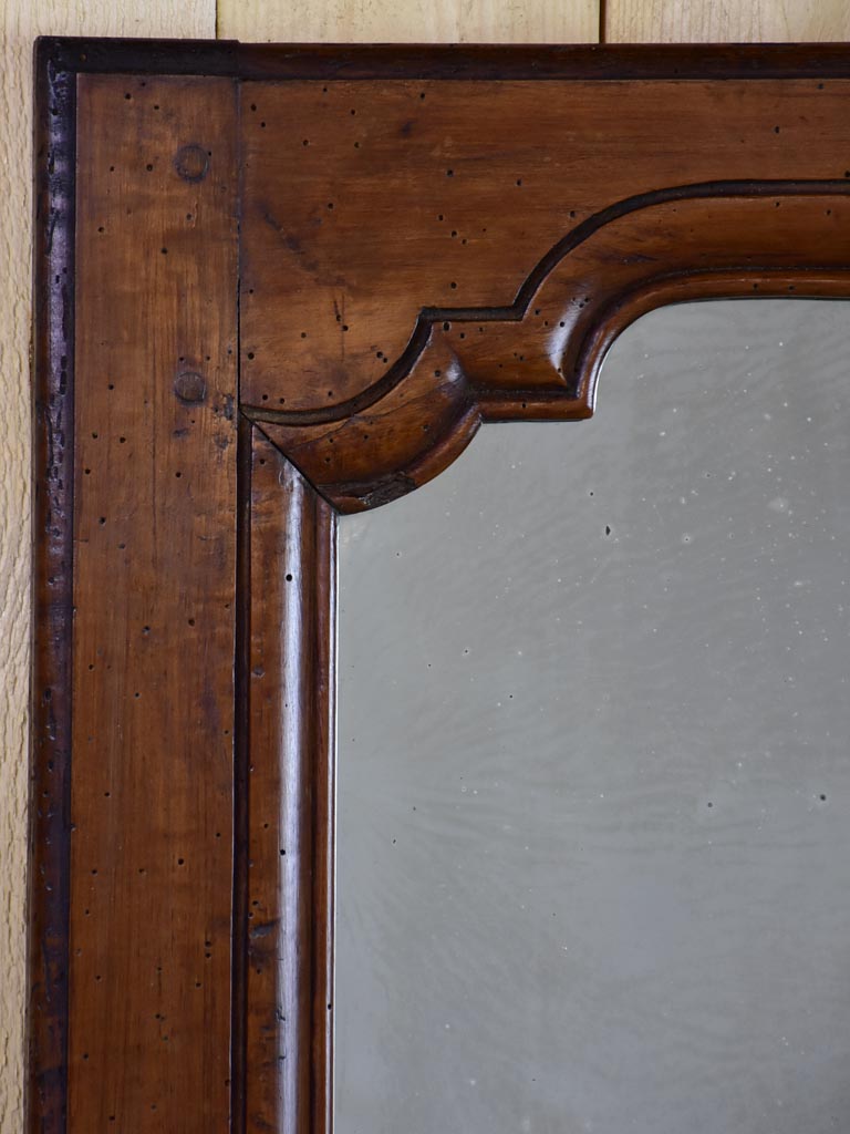 Small Louis XV style walnut mirror from the 19th century 20¾" x 26"