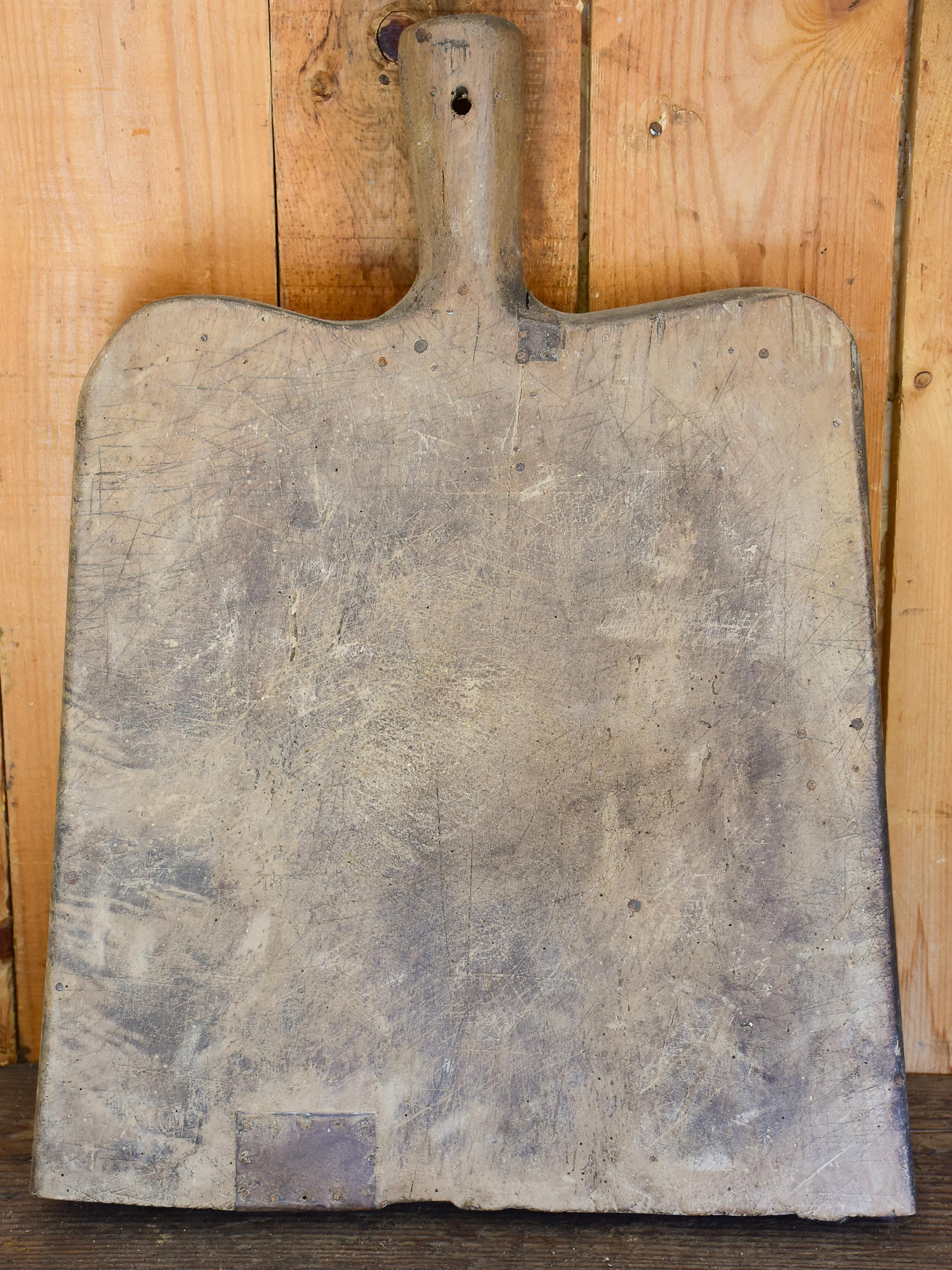 Antique French cutting board with rounded edges