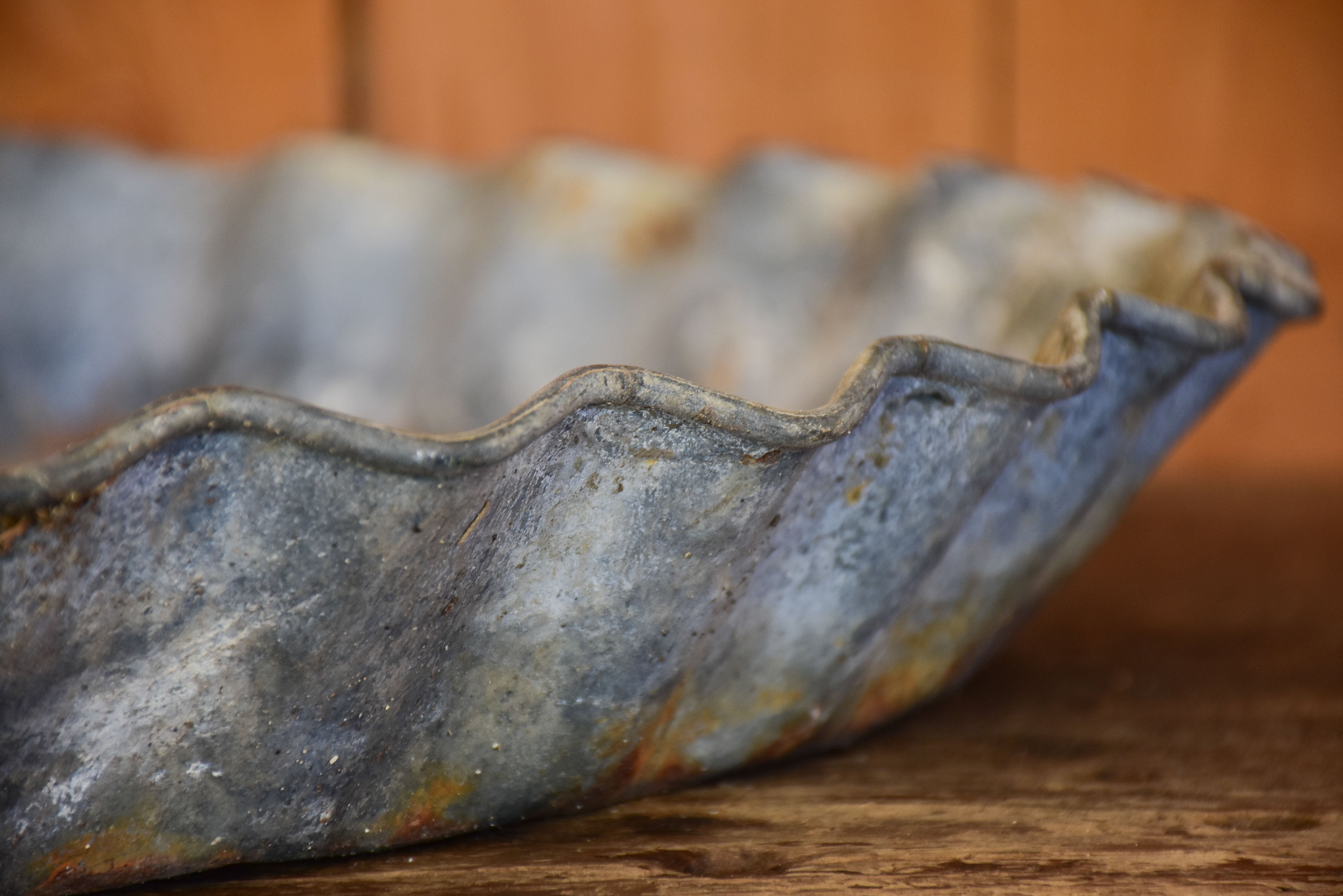 Large antique zinc dish with rippled edge