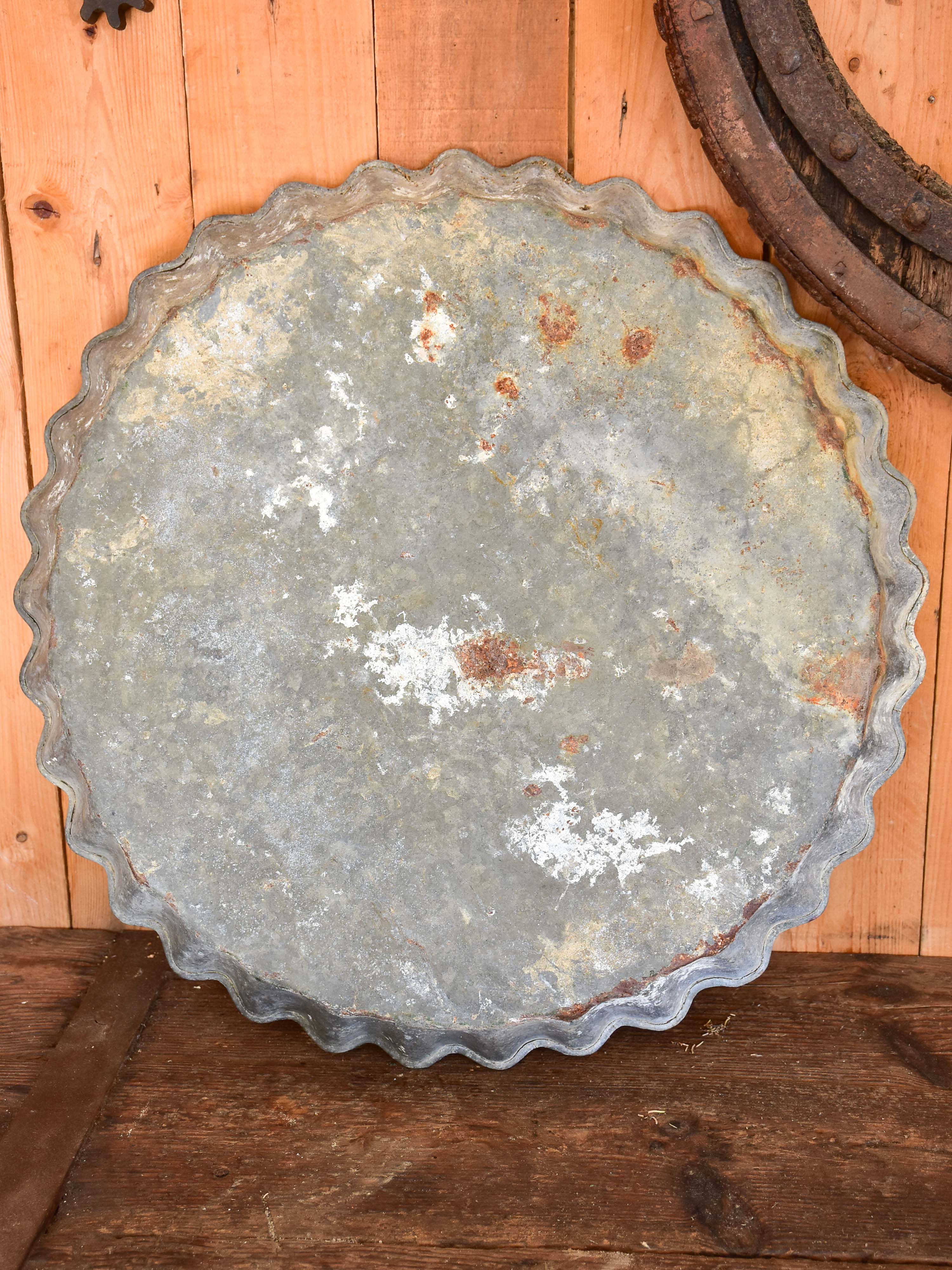 Large antique zinc dish with rippled edge