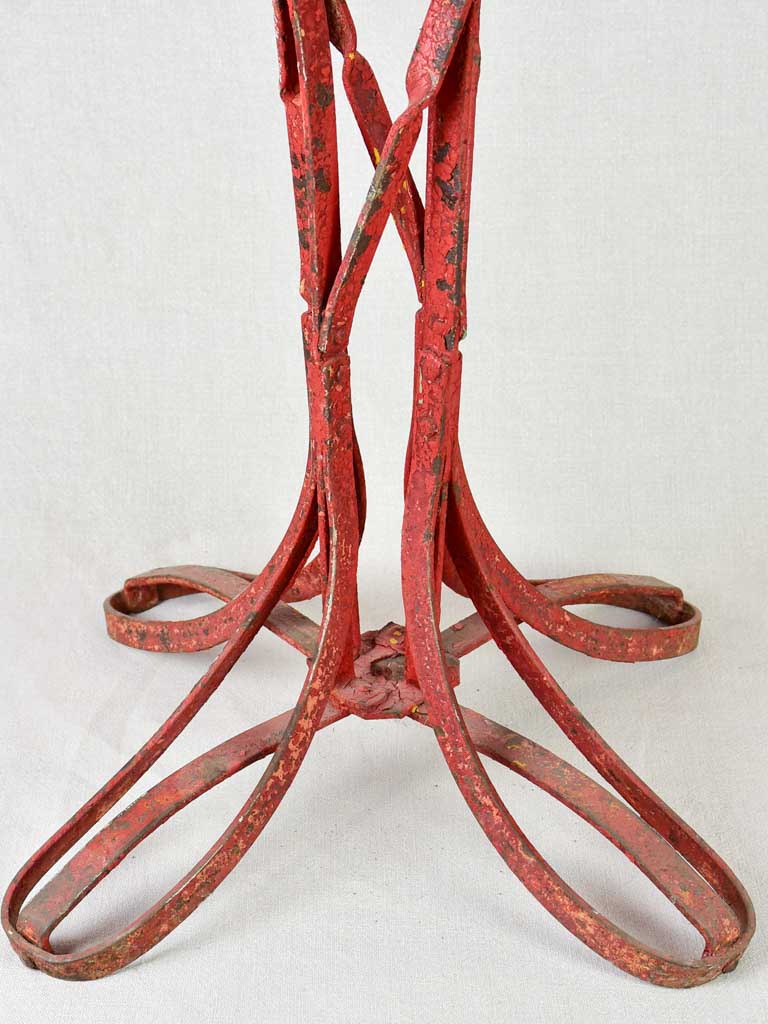 Early twentieth century bistro garden table with yellow and red patina