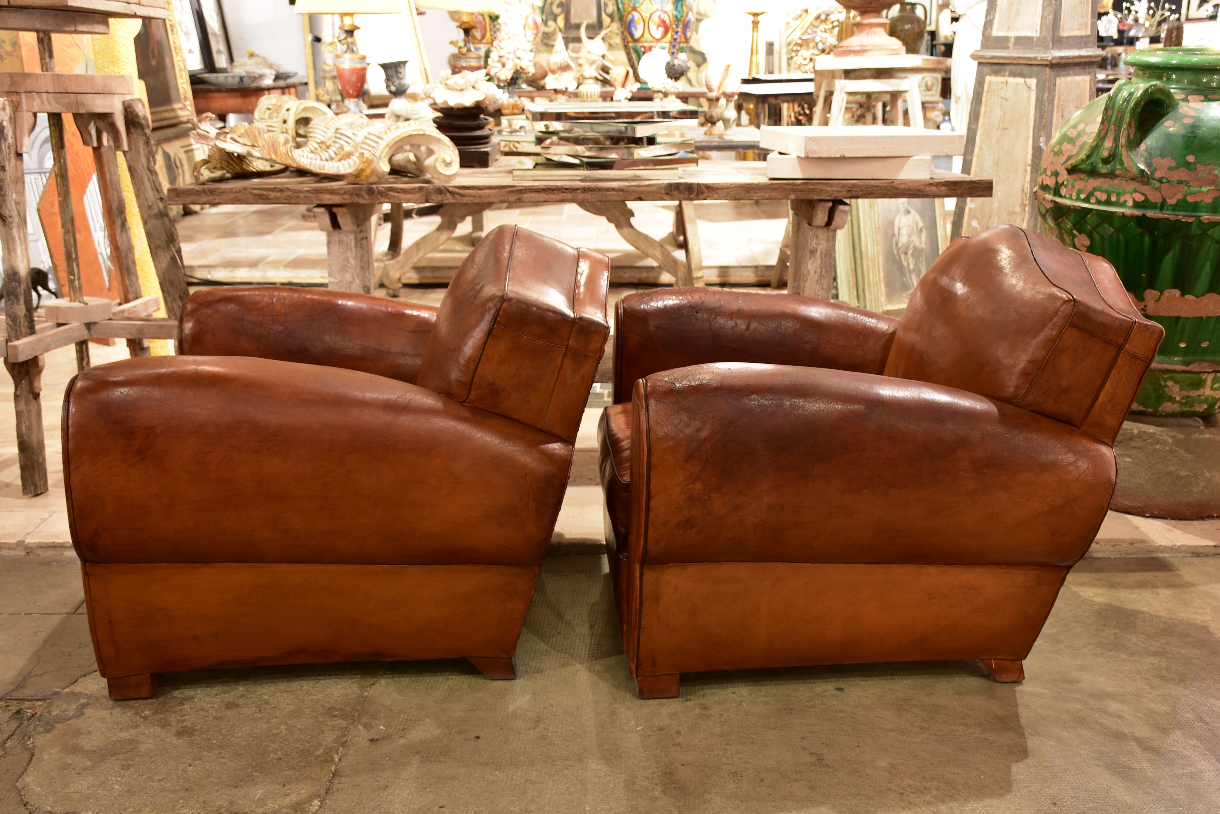 Pair of French chapeau gendarme back club chairs