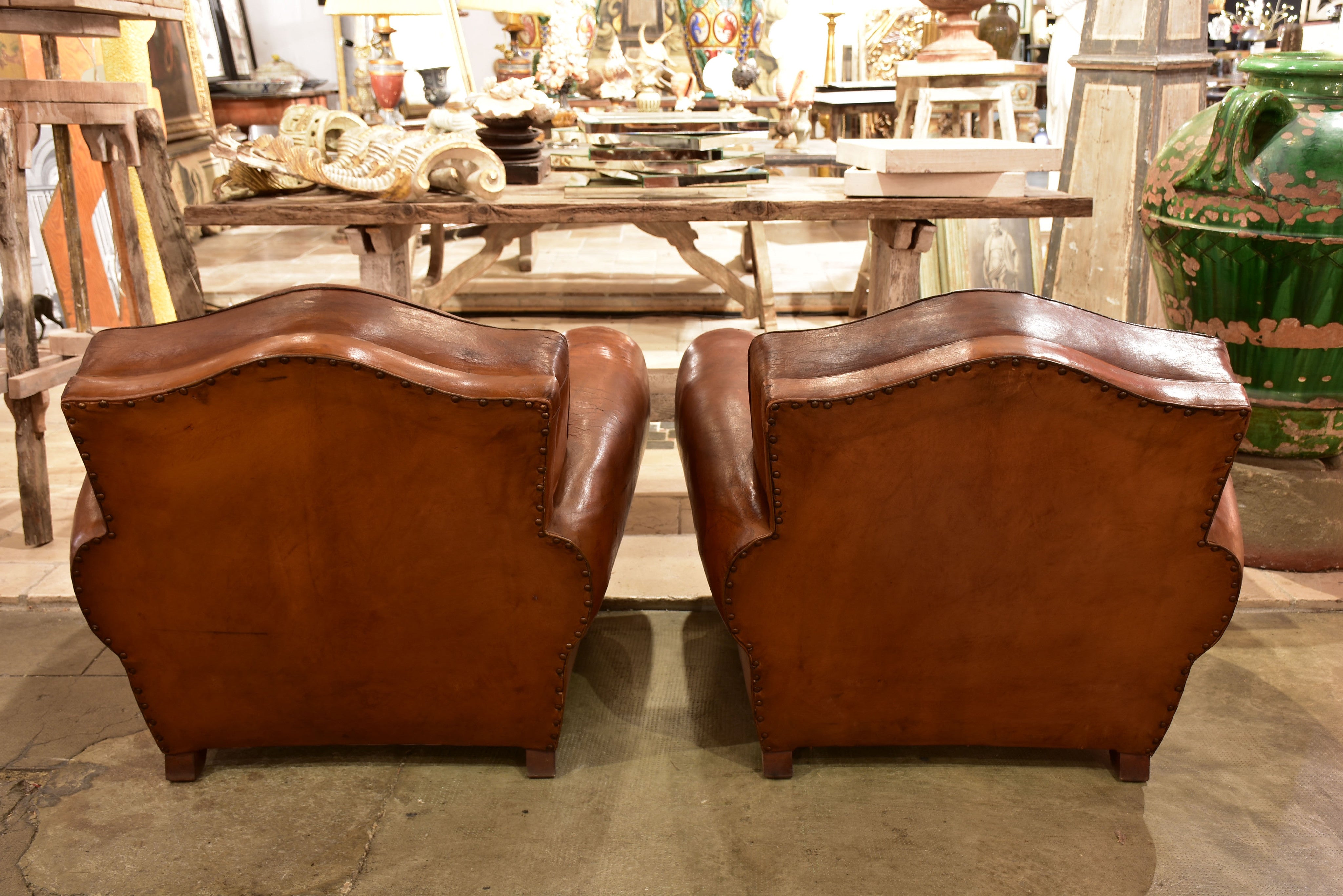 Pair of French chapeau gendarme back club chairs