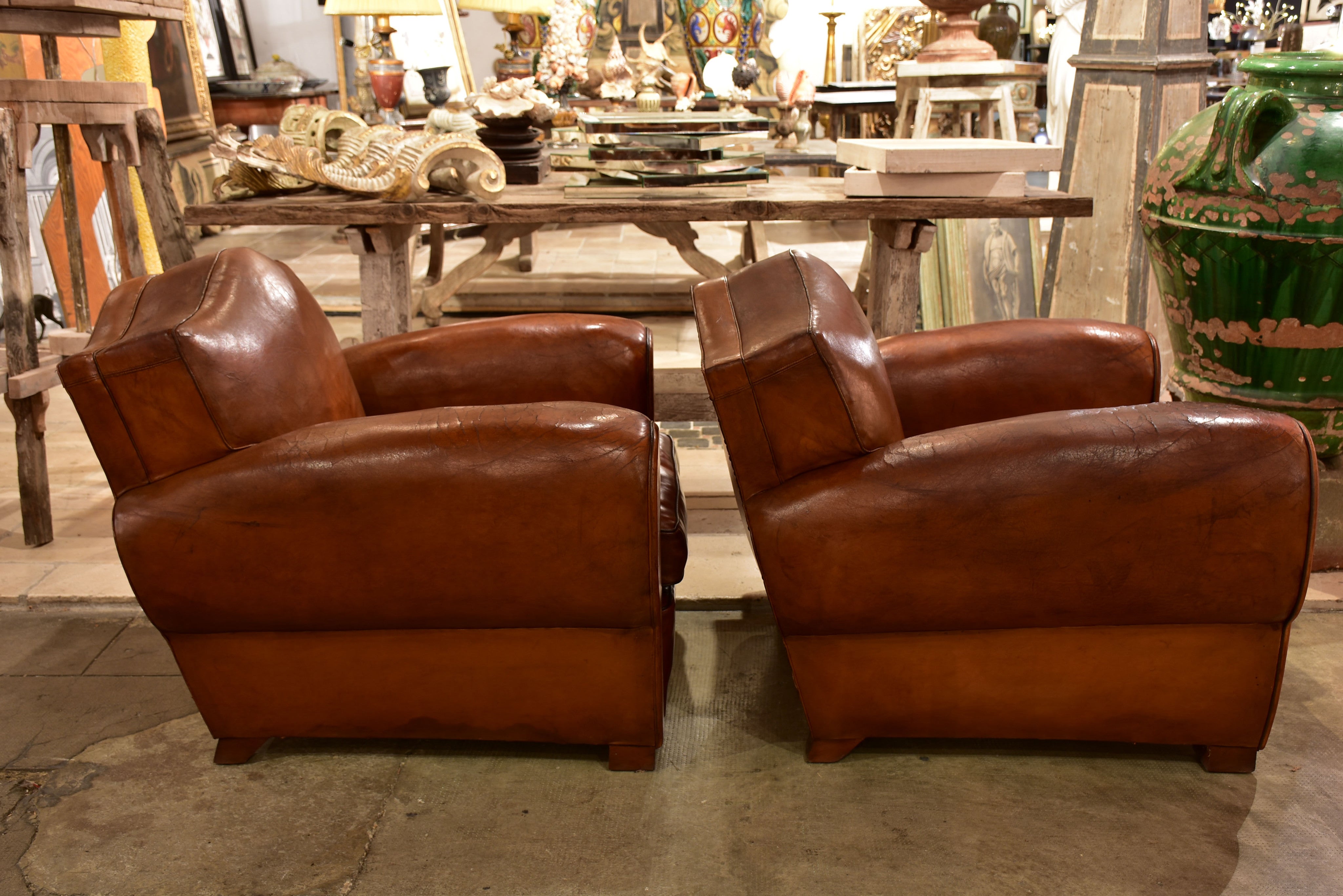 Pair of French chapeau gendarme back club chairs