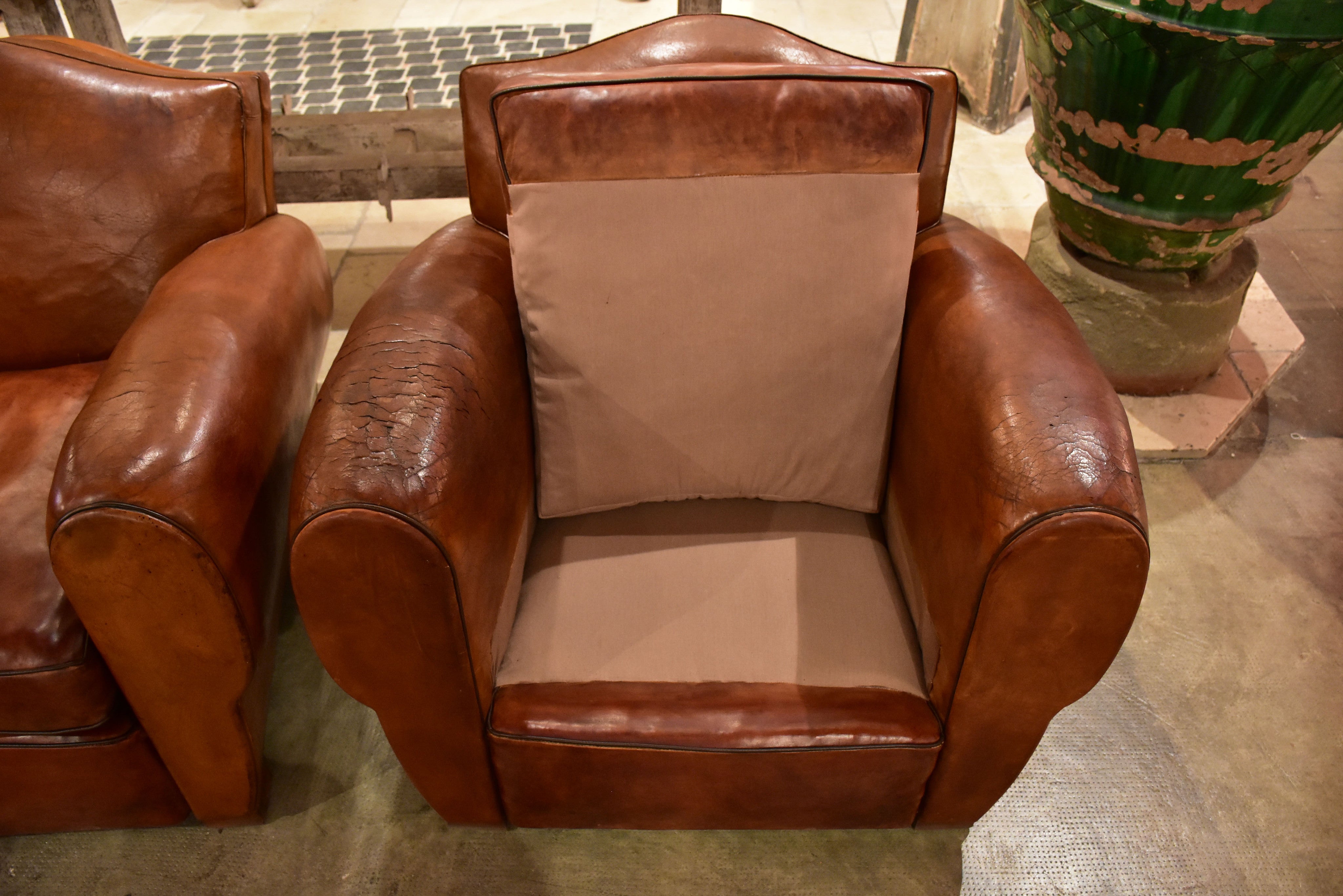 Pair of French chapeau gendarme back club chairs