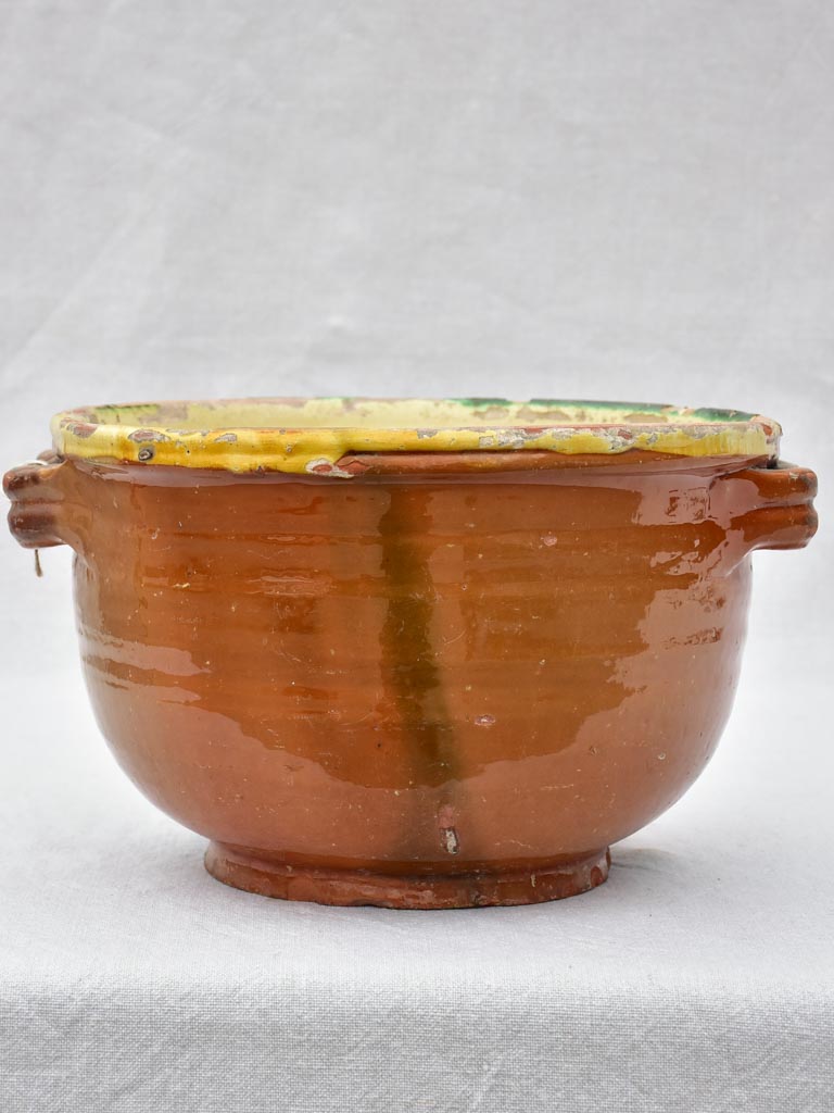 Large antique French casserole bowl with brown and yellow glaze and double handles 8"