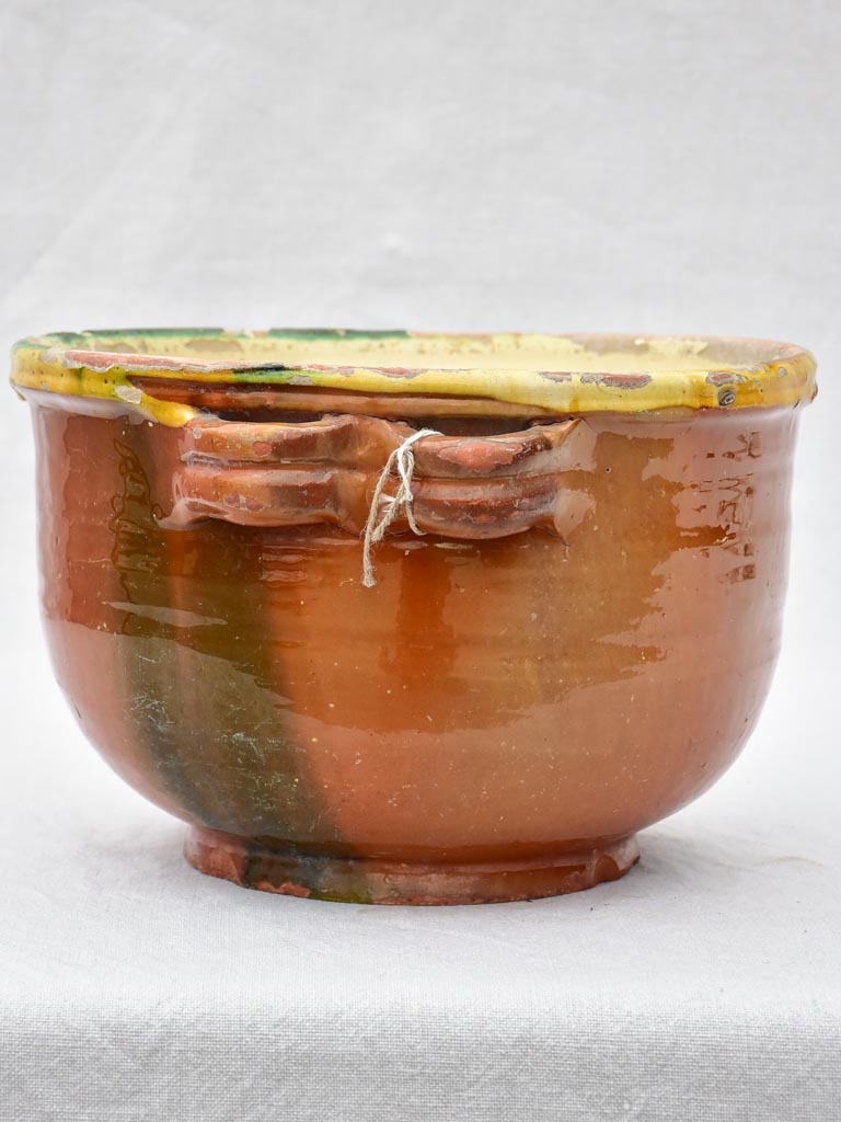 Large antique French casserole bowl with brown and yellow glaze and double handles 8"