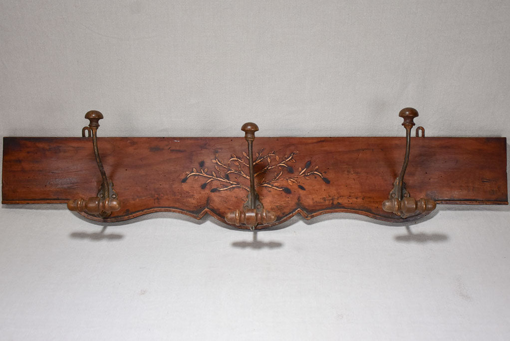 Salvaged 19th Century coat rack with olive tree marquetry 44"